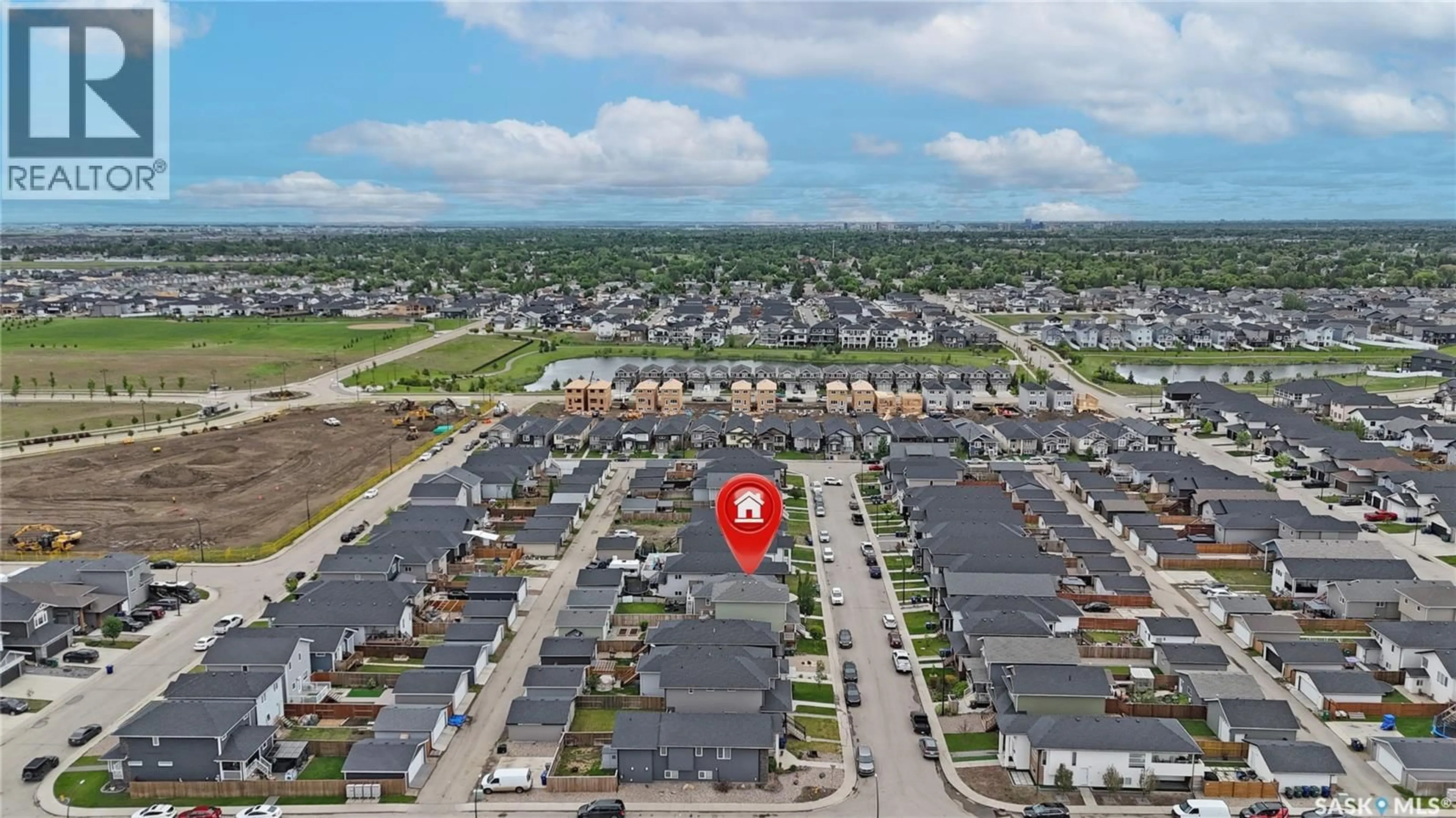A pic from outside/outdoor area/front of a property/back of a property/a pic from drone, street for 419 ELLS WAY, Saskatoon Saskatchewan S7L6K8