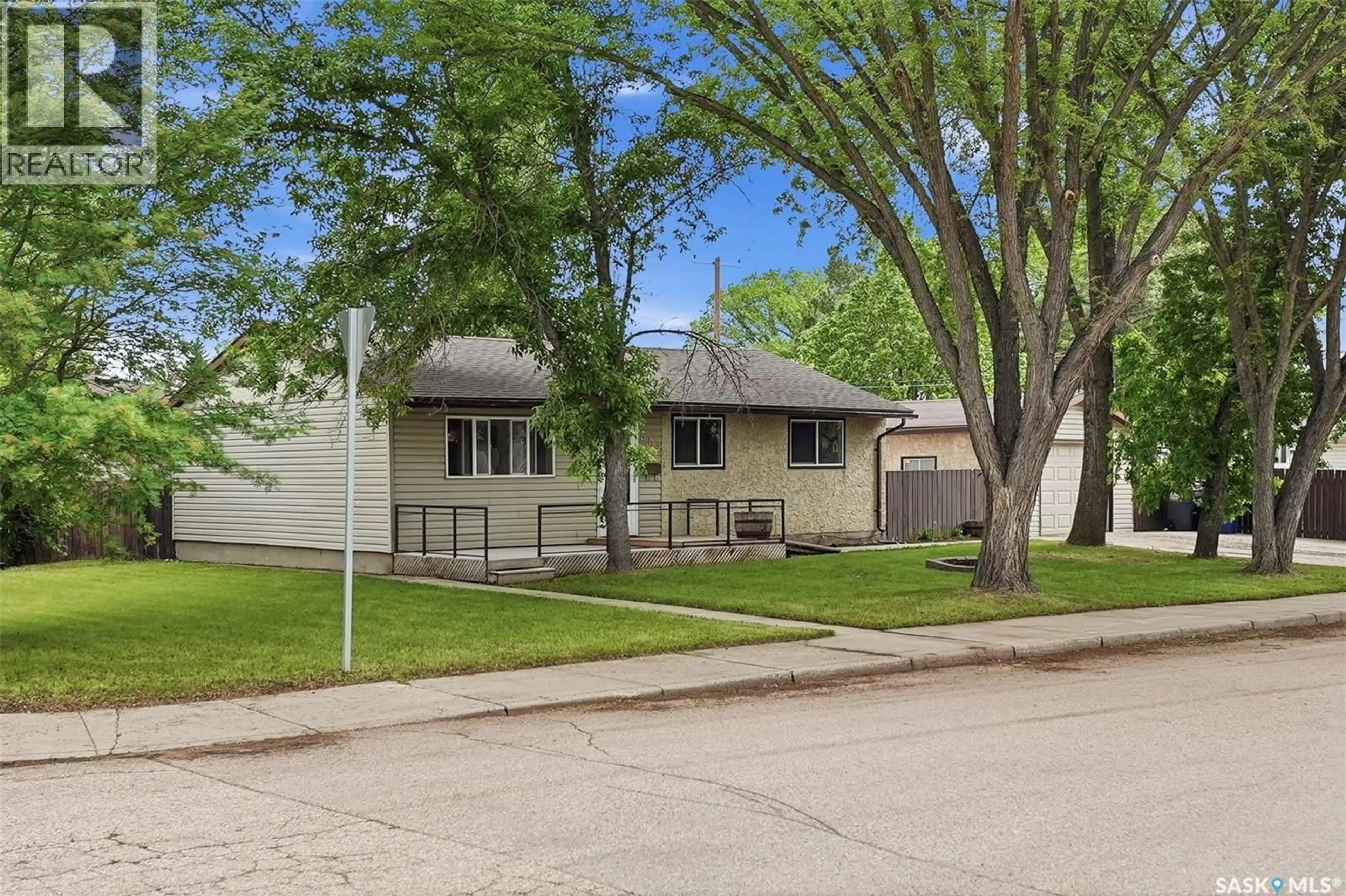 Home with vinyl exterior material, street for 502 X AVENUE, Saskatoon Saskatchewan S7L3K2