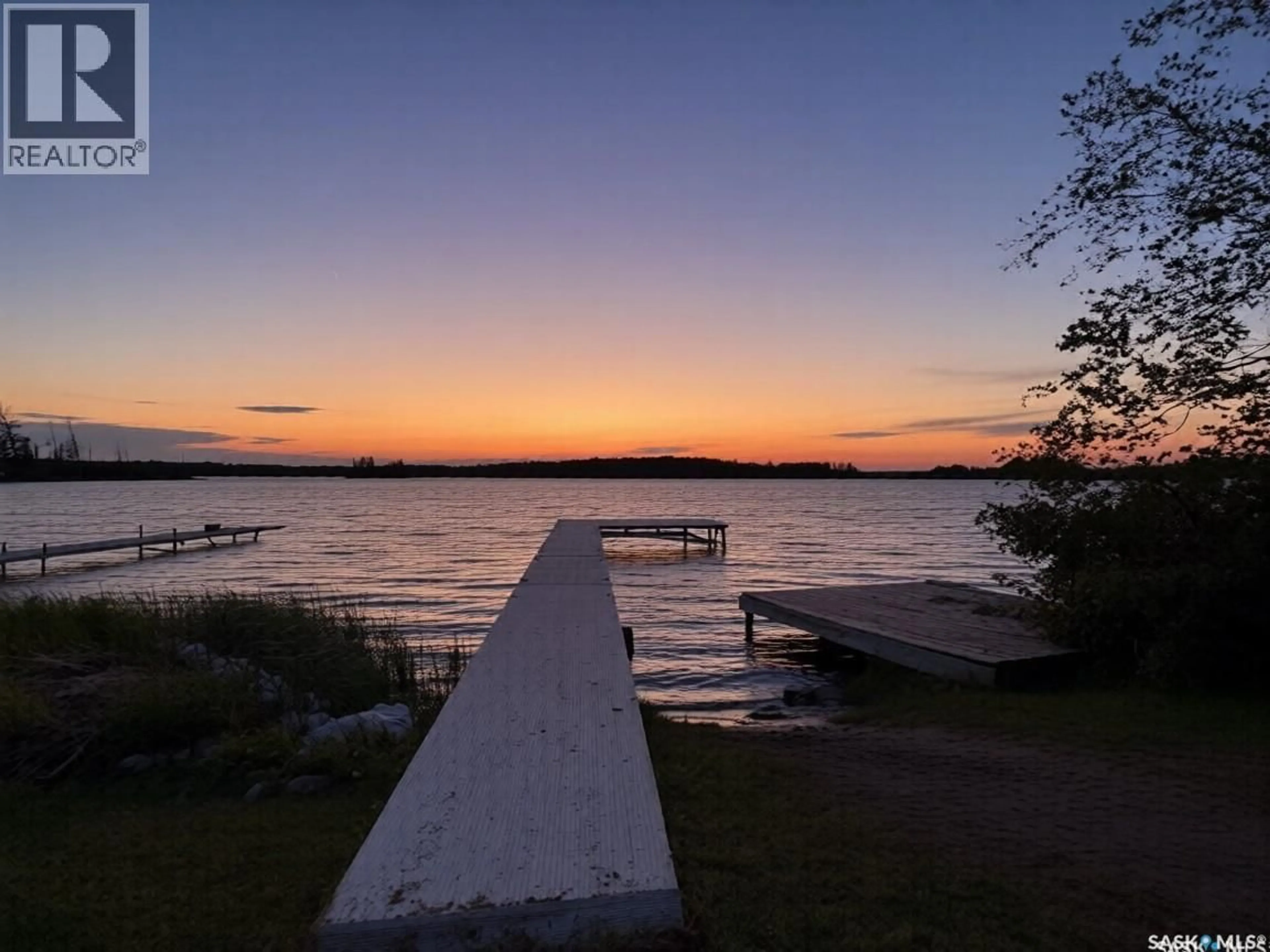 A pic from outside/outdoor area/front of a property/back of a property/a pic from drone, water/lake/river/ocean view for 707 SUNSET STREET, Canwood Rm No. 494 Saskatchewan S0J2X0