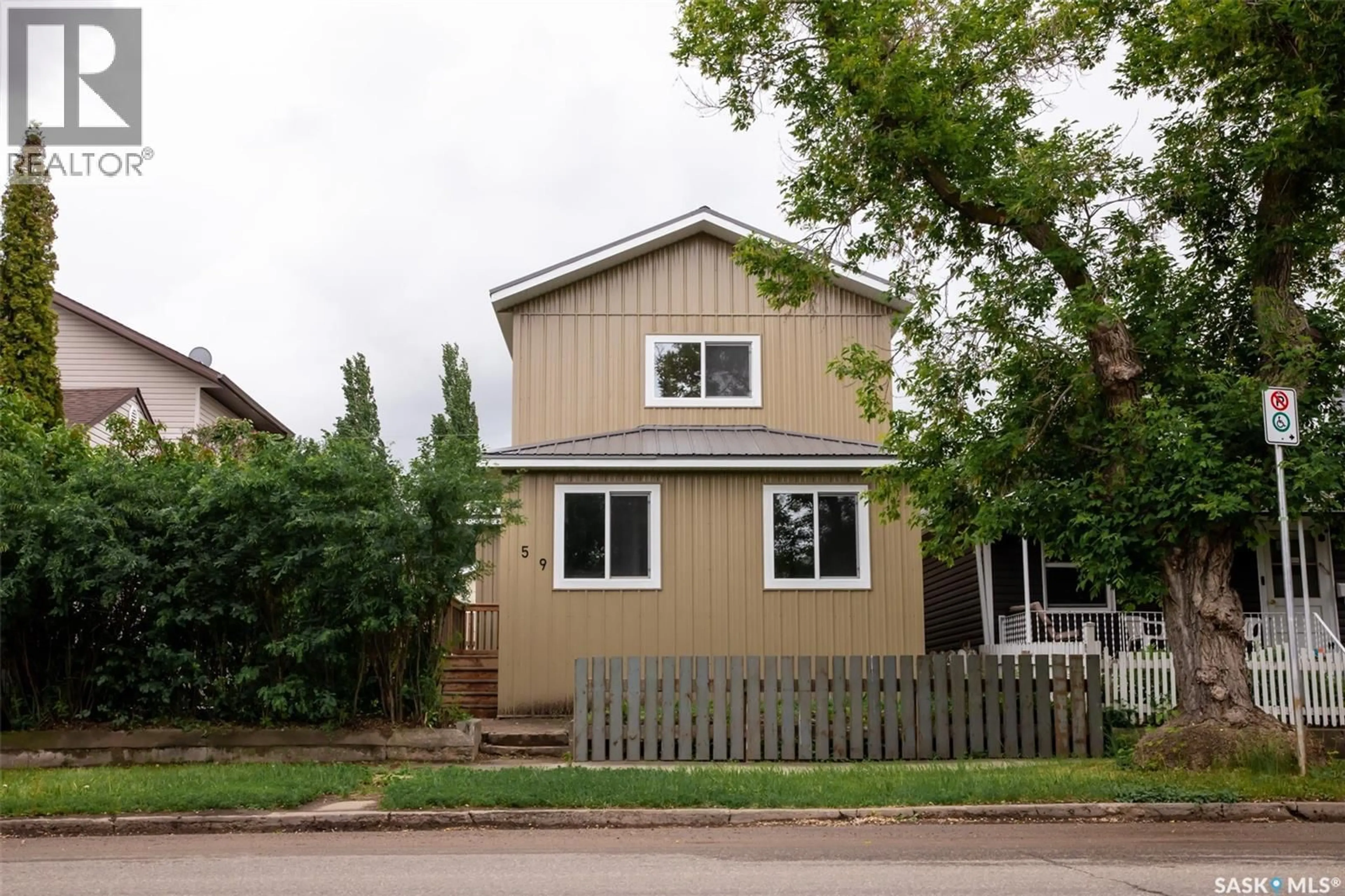 Home with vinyl exterior material, street for 59 LILLOOET STREET, Moose Jaw Saskatchewan S6H4S3