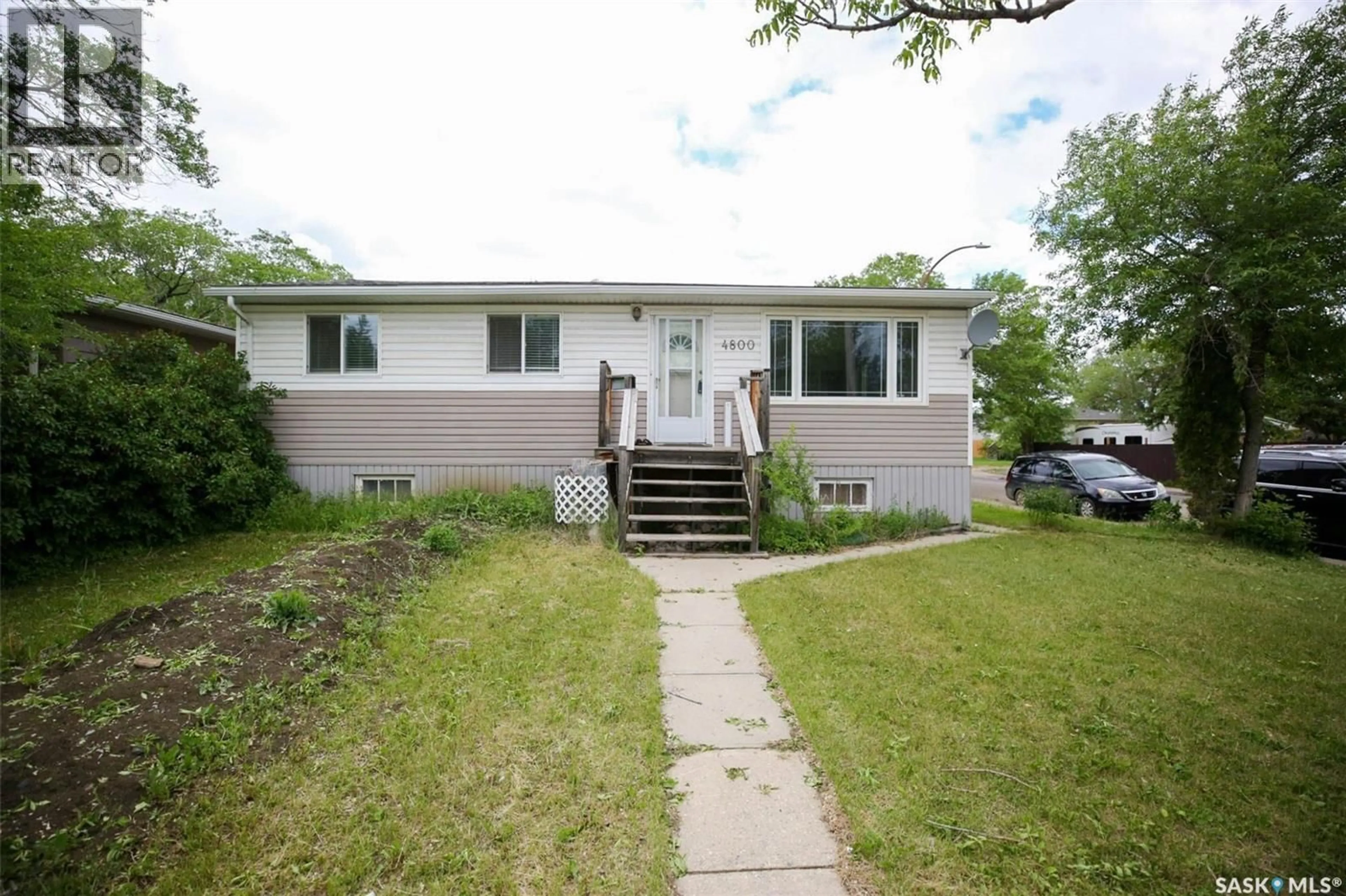 Home with vinyl exterior material, street for 4800 4TH AVENUE, Regina Saskatchewan S4T0J2