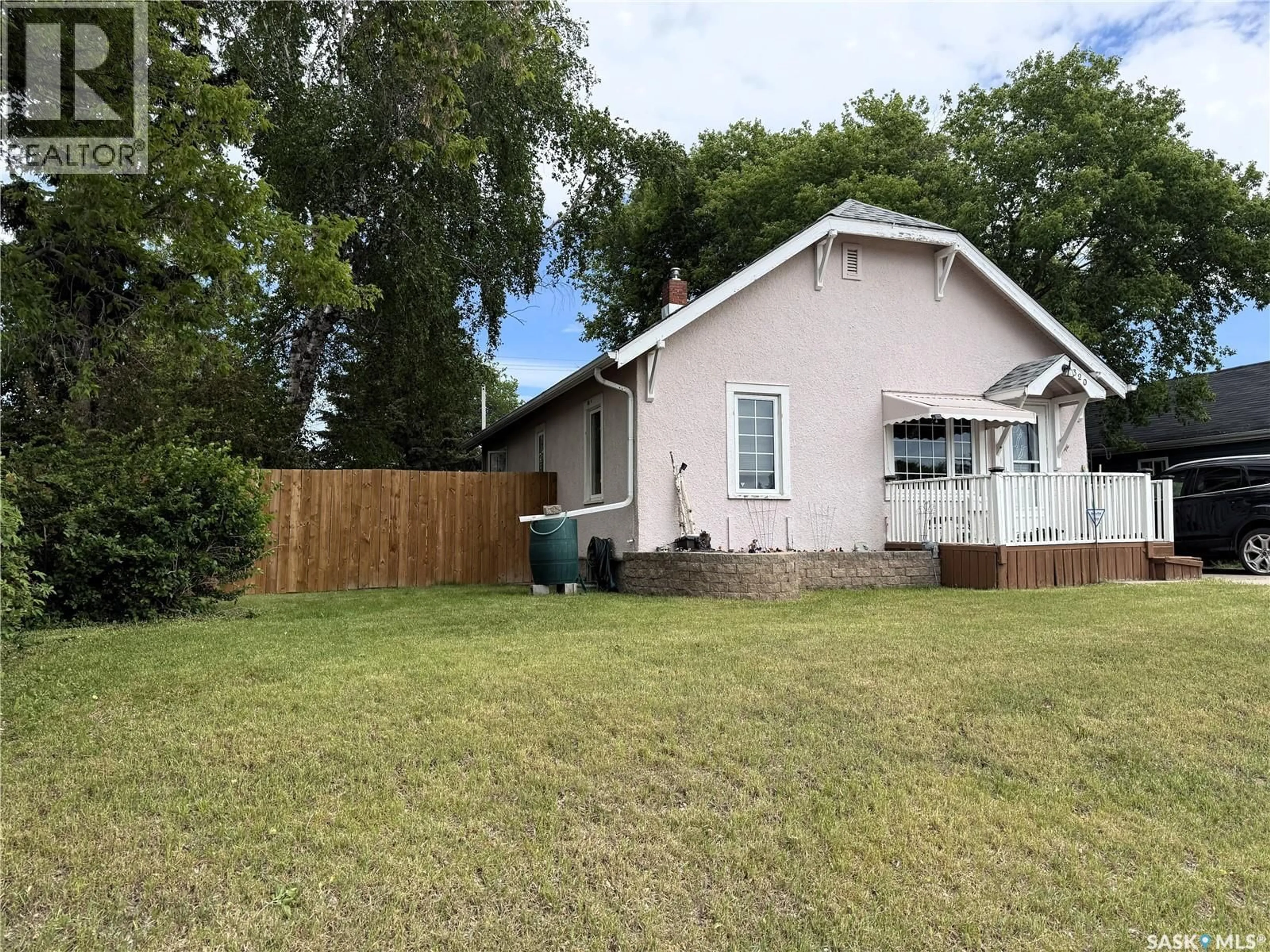 A pic from outside/outdoor area/front of a property/back of a property/a pic from drone, street for 320 23RD STREET, Prince Albert Saskatchewan S6V1P7