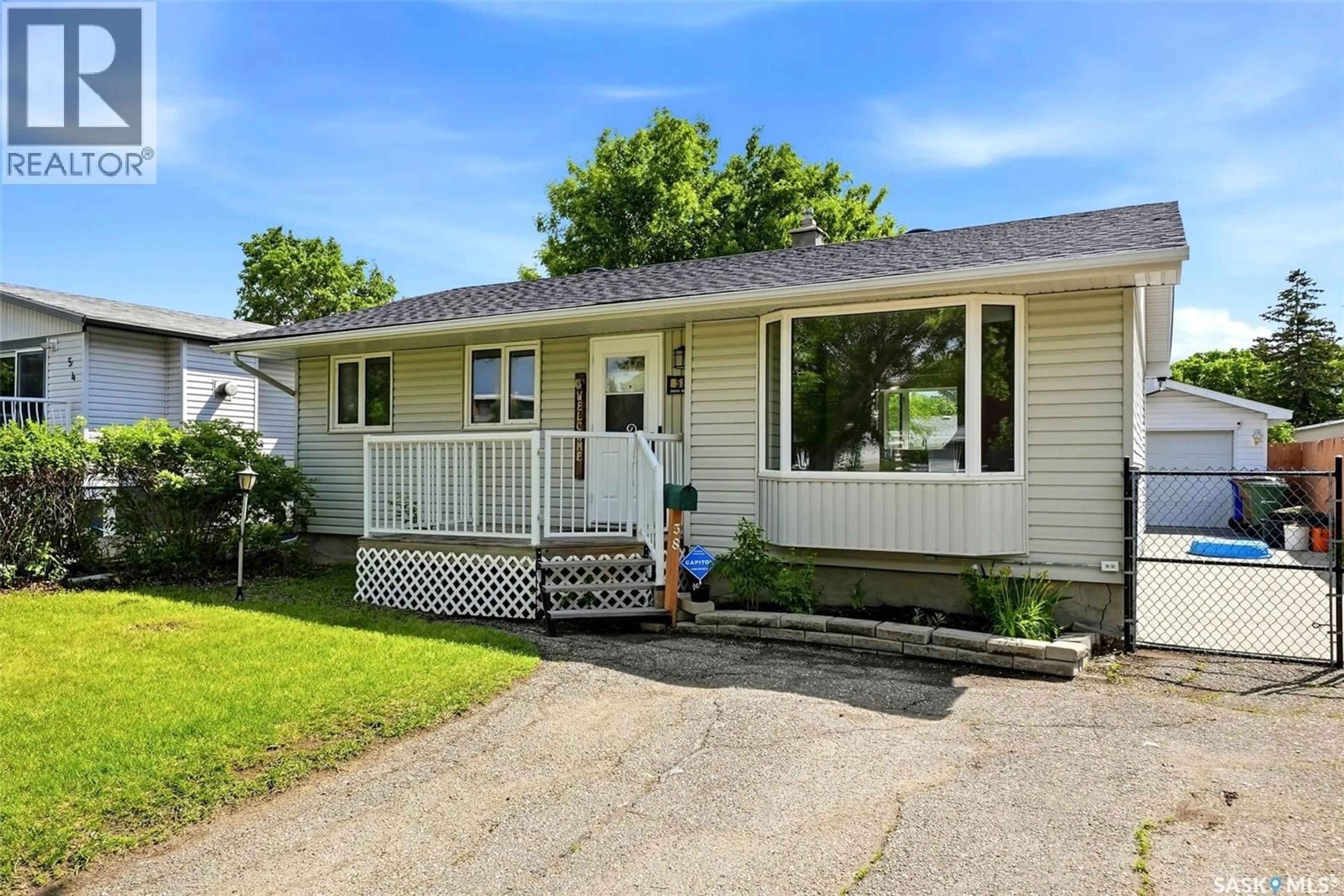 Home with vinyl exterior material, street for 58 BIRD BAY, Regina Saskatchewan S4N1P9