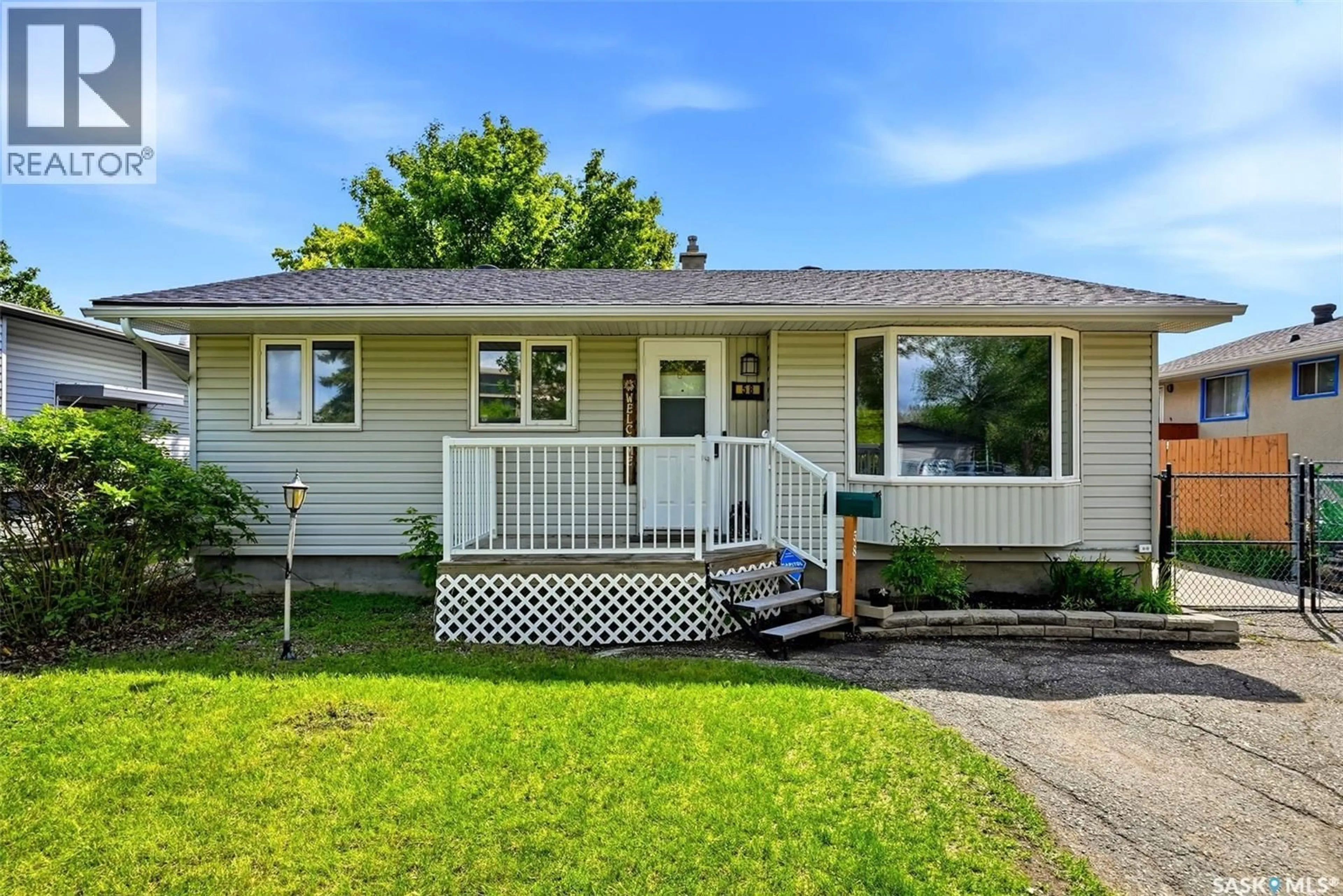 Home with vinyl exterior material, street for 58 BIRD BAY, Regina Saskatchewan S4N1P9