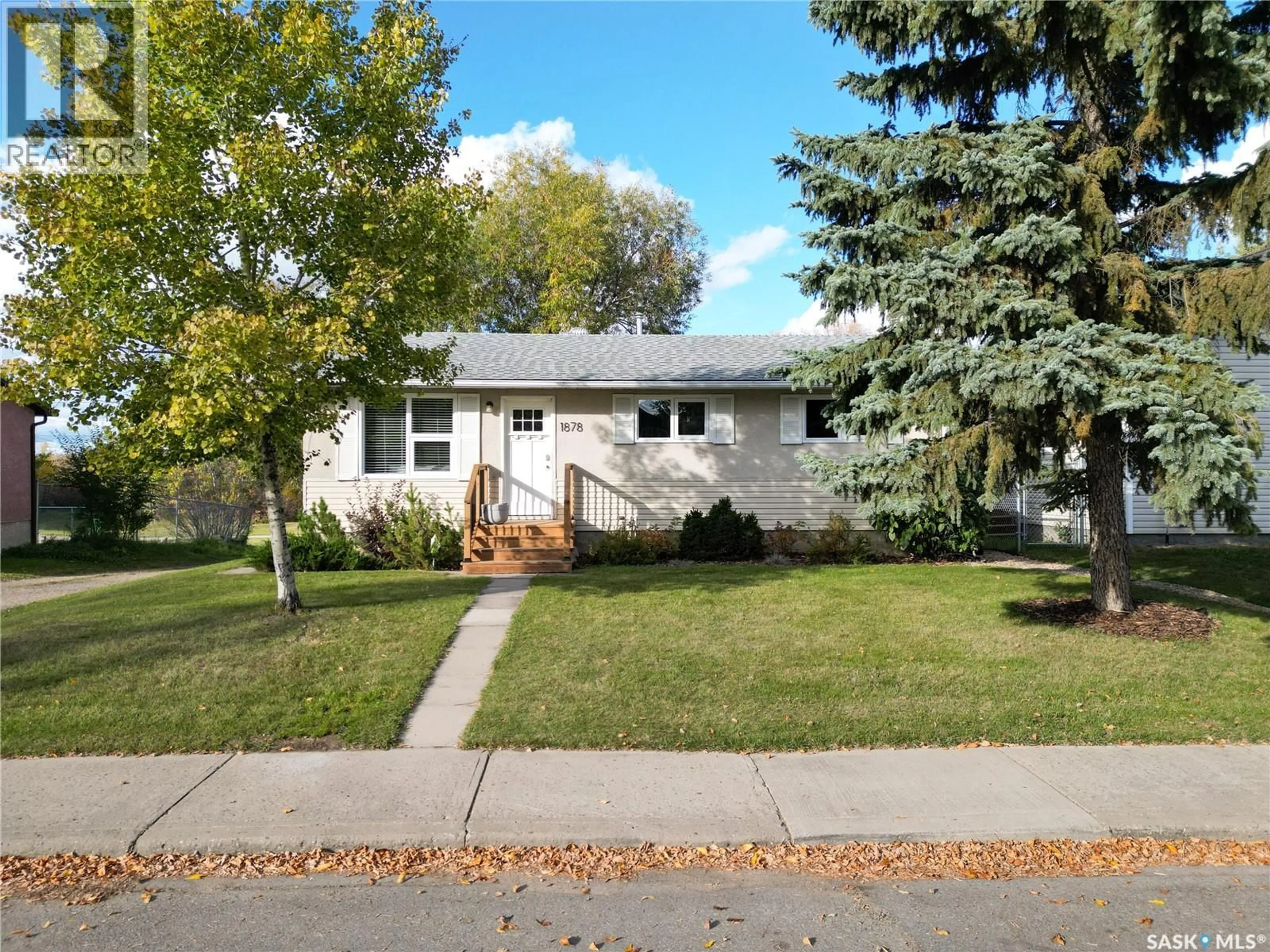 Home with vinyl exterior material, street for 1878 13TH STREET, Prince Albert Saskatchewan S6V3K3