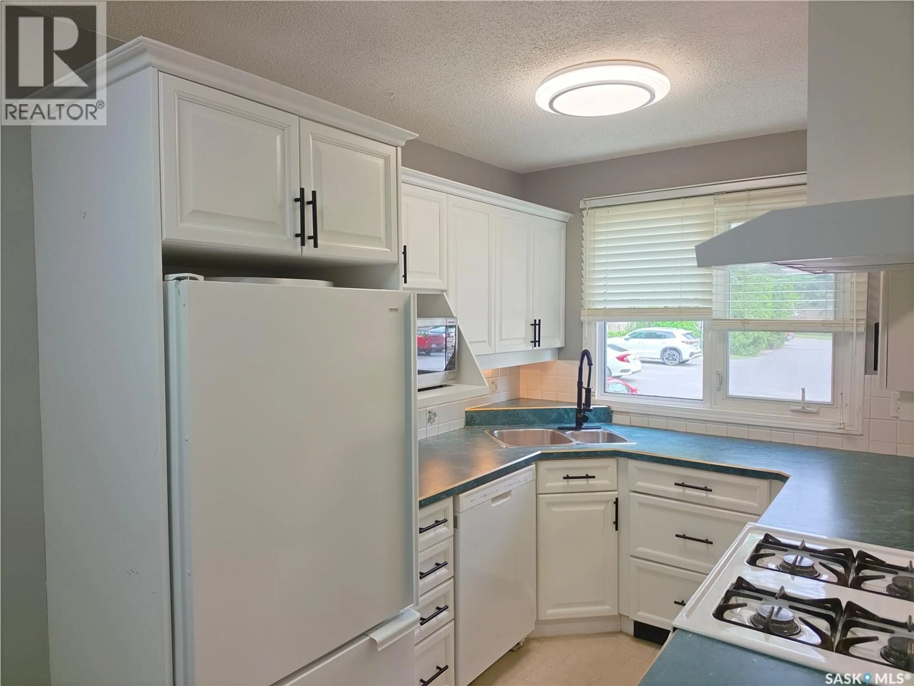 Standard kitchen, ceramic/tile floor for 18 - 1128 MCKERCHER DRIVE, Saskatoon Saskatchewan S7H4Y7