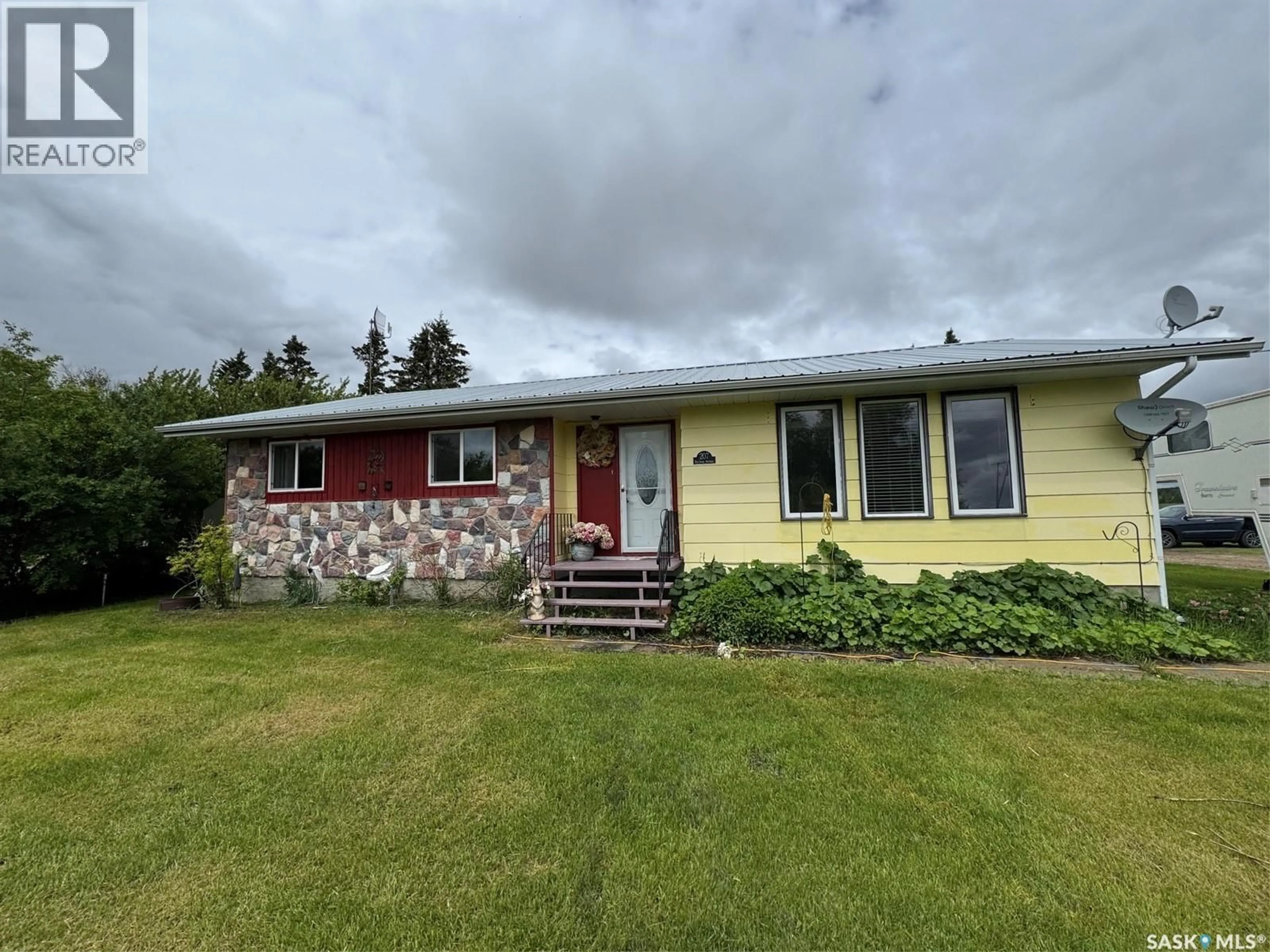 A pic from outside/outdoor area/front of a property/back of a property/a pic from drone, street for 207 RAILWAY AVENUE, Rabbit Lake Saskatchewan S0M2L0