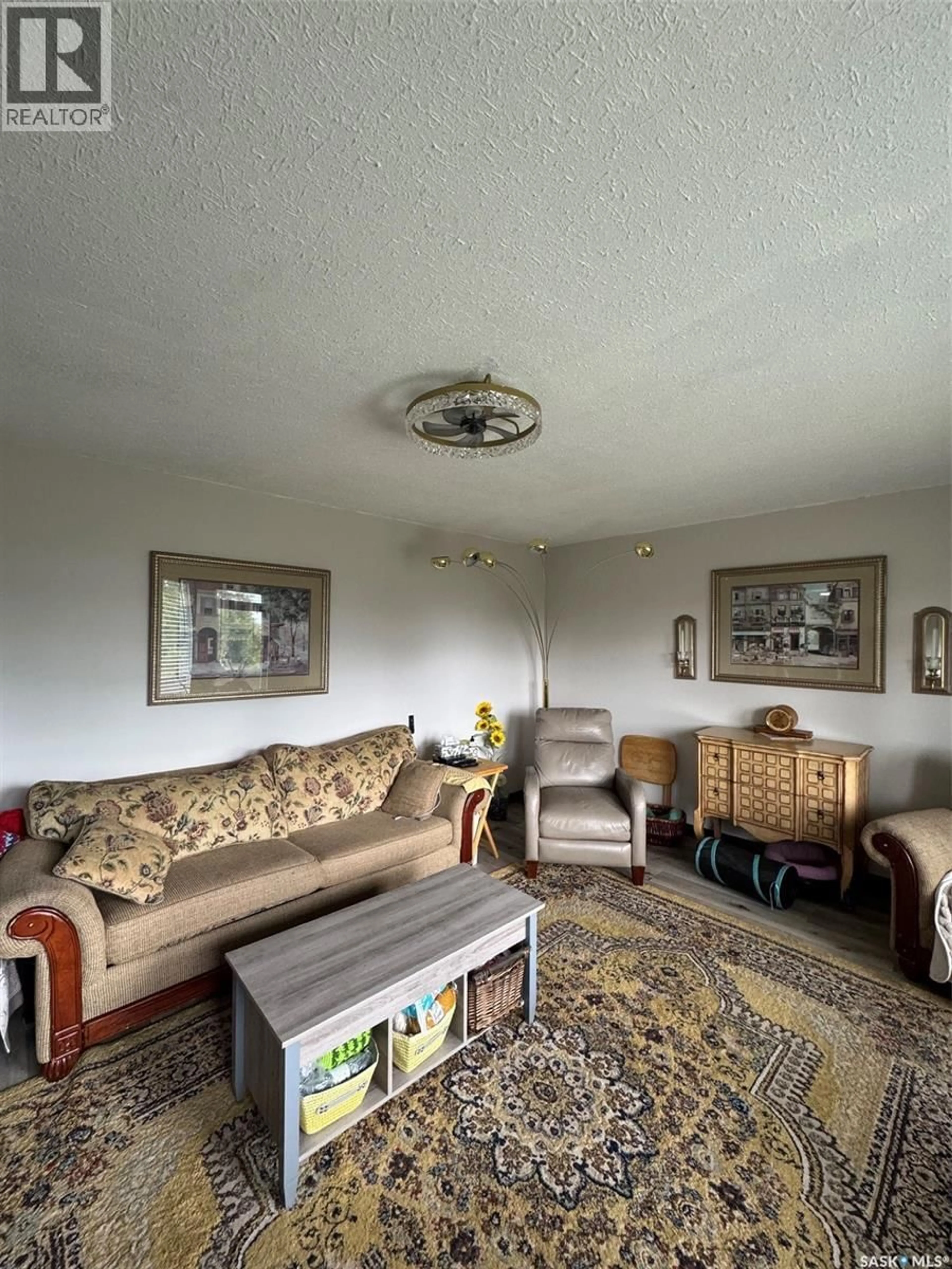 Living room with furniture, unknown for 207 RAILWAY AVENUE, Rabbit Lake Saskatchewan S0M2L0