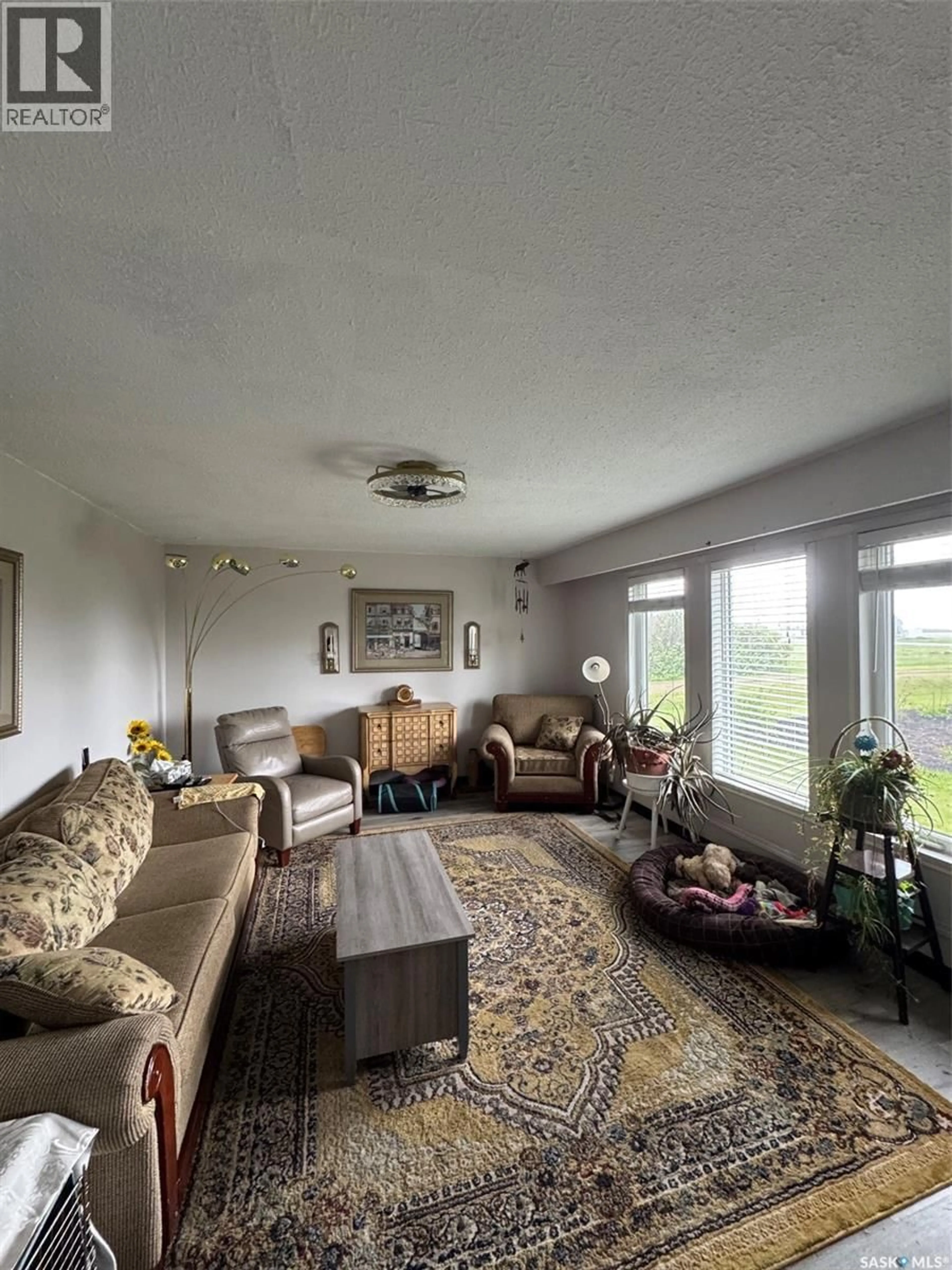 Living room with furniture, unknown for 207 RAILWAY AVENUE, Rabbit Lake Saskatchewan S0M2L0