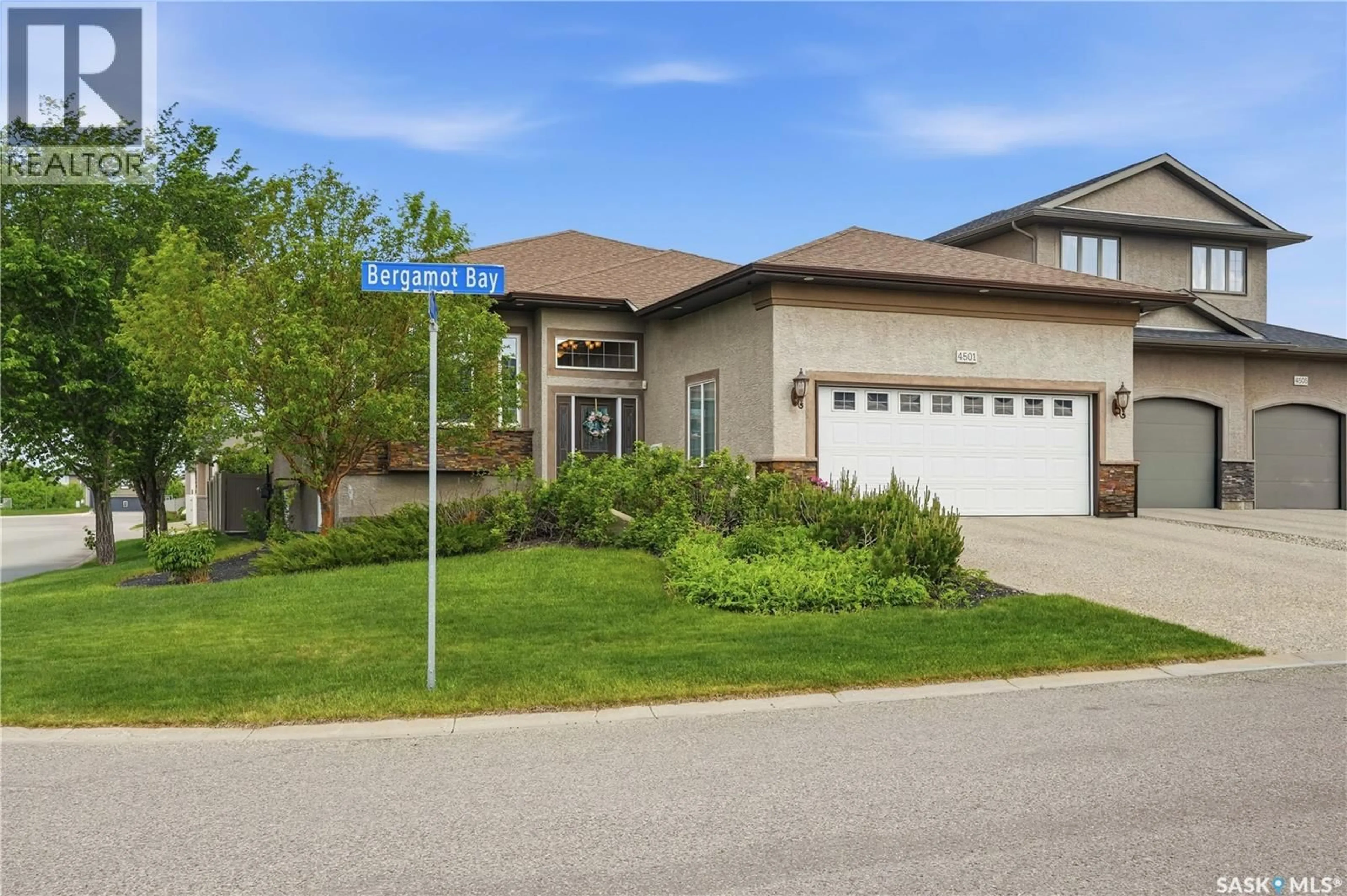 Home with brick exterior material, street for E - 4501 BERGAMOT BAY, Regina Saskatchewan S4V1M8