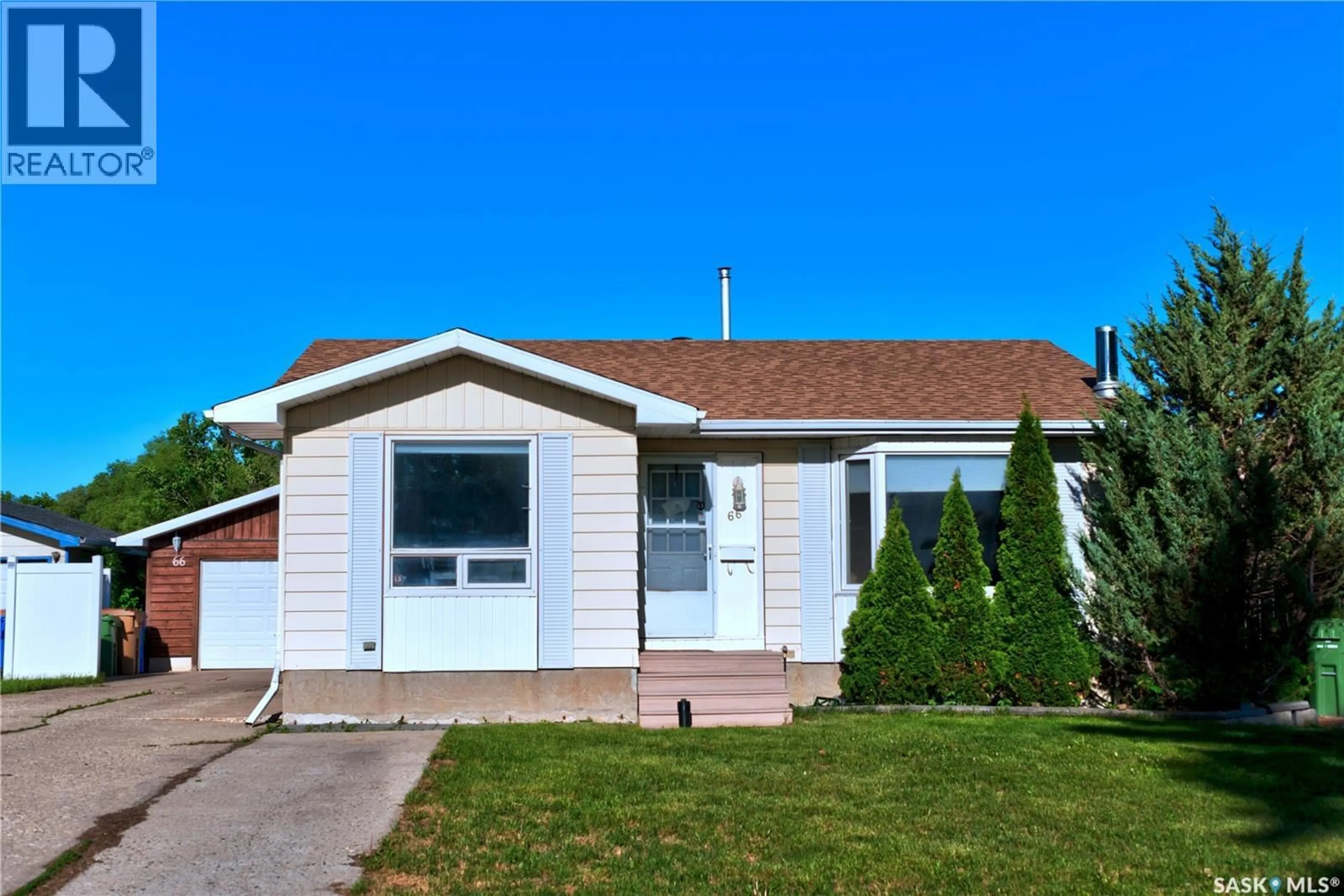 Home with vinyl exterior material, street for 66 DENNY CRESCENT, Regina Saskatchewan S4N5J9