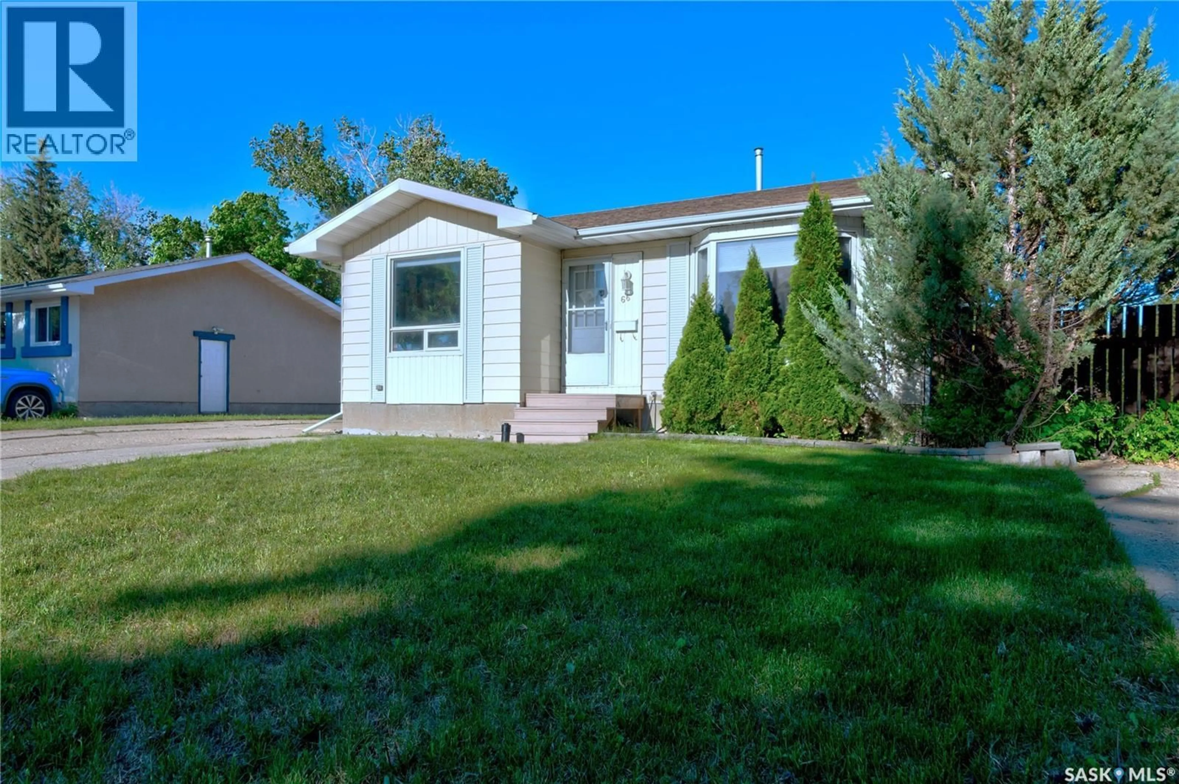 Home with vinyl exterior material, street for 66 DENNY CRESCENT, Regina Saskatchewan S4N5J9