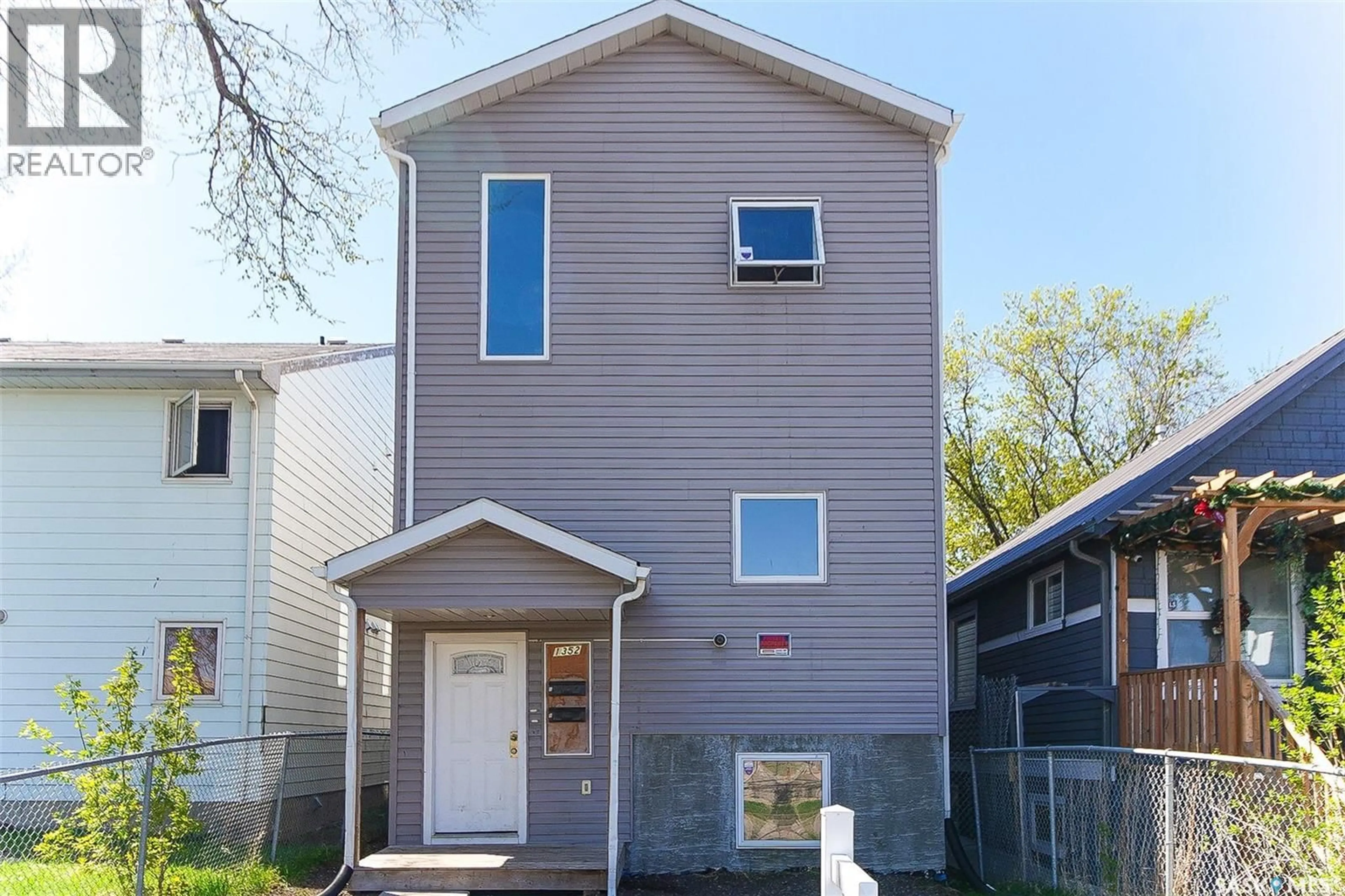 Home with vinyl exterior material, street for 1352 ANGUS STREET, Regina Saskatchewan S4T1Y8