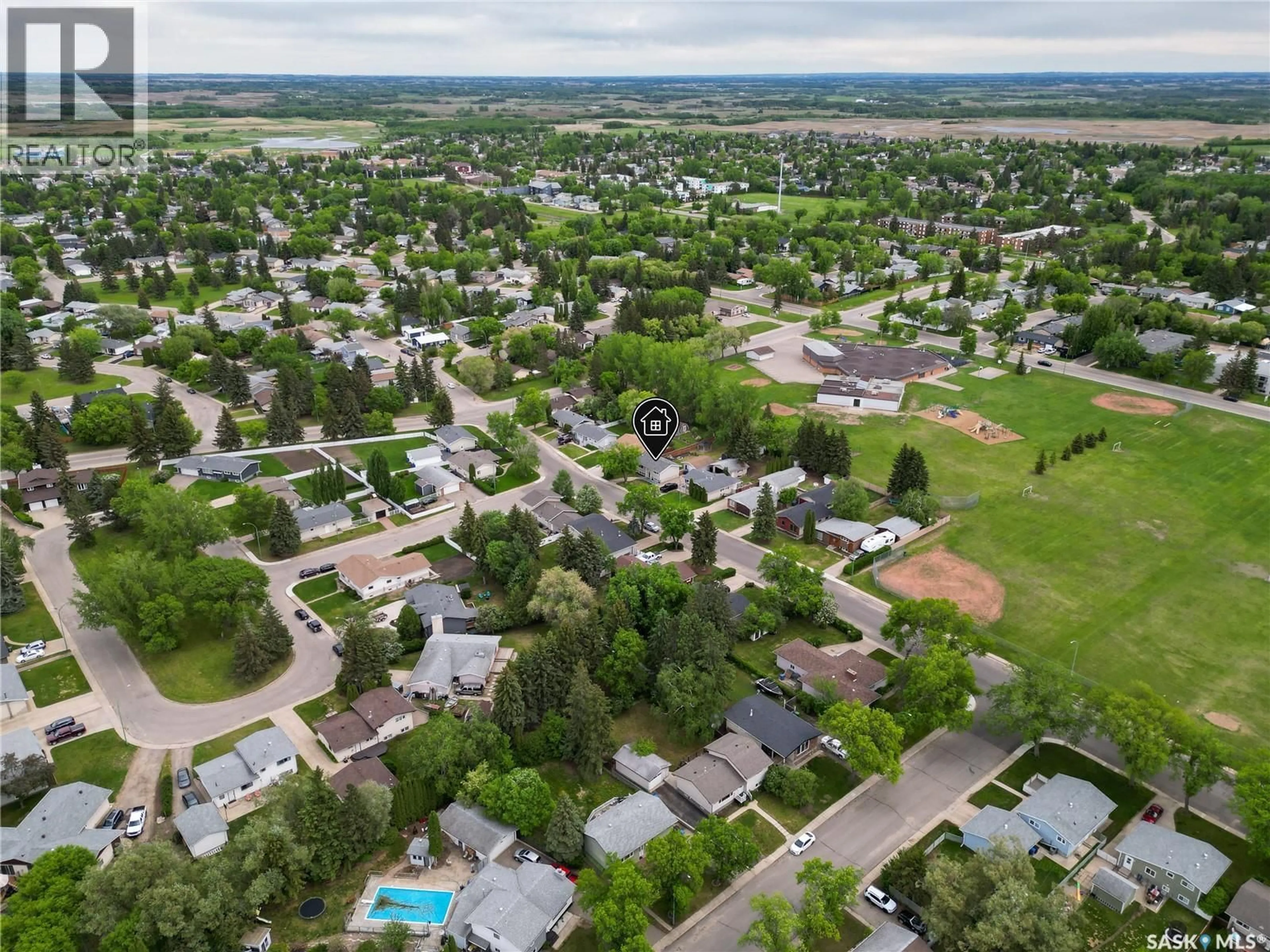 A pic from outside/outdoor area/front of a property/back of a property/a pic from drone, street for 1171 COOK DRIVE, Prince Albert Saskatchewan S6V2R7