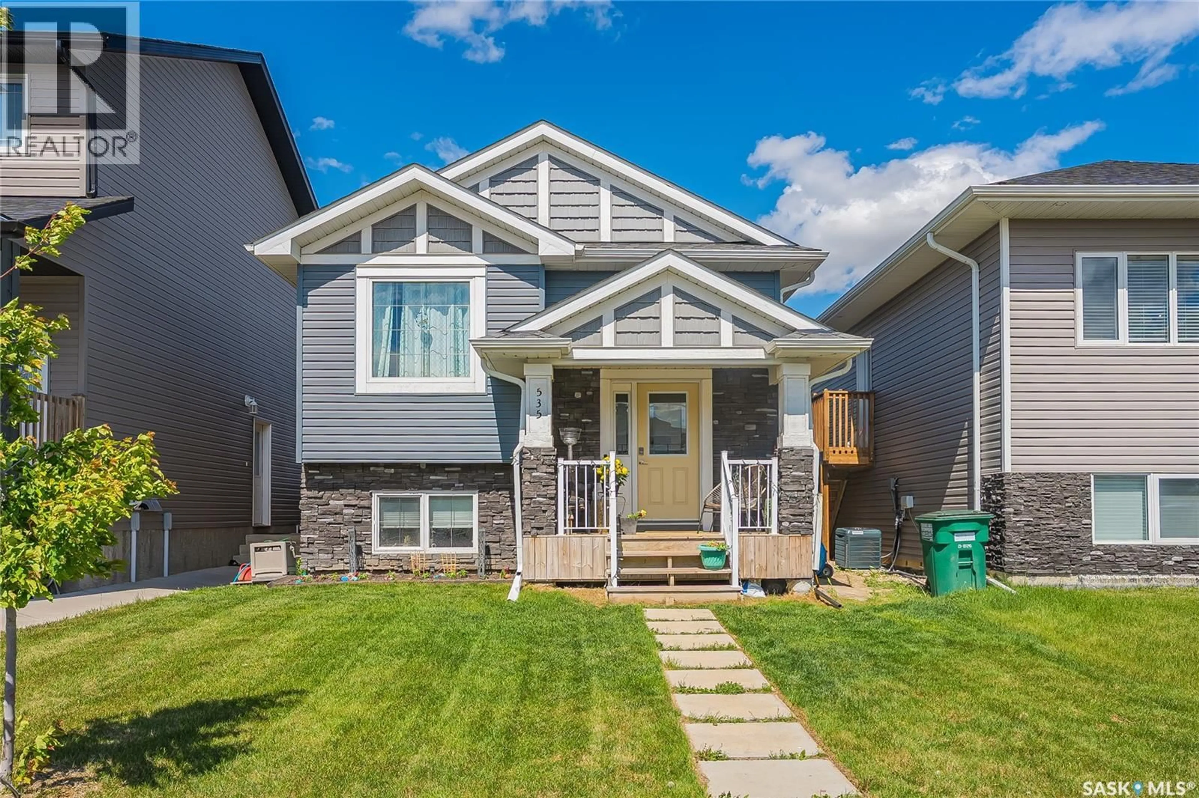 Home with vinyl exterior material, street for 535 FAST WAY, Saskatoon Saskatchewan S7W0X1