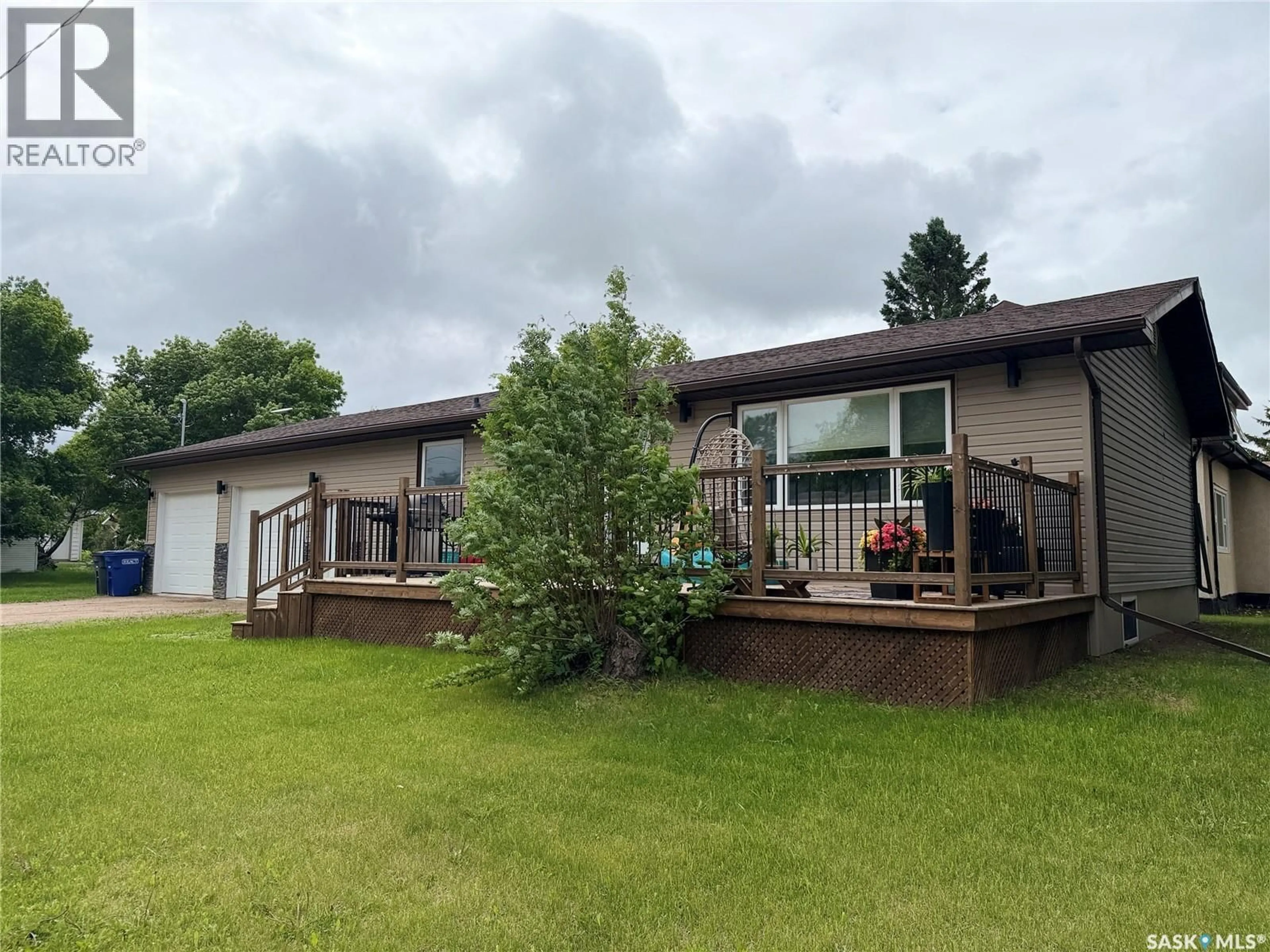 A pic from outside/outdoor area/front of a property/back of a property/a pic from drone, water/lake/river/ocean view for 23 WEXFORD STREET, Lanigan Saskatchewan S0K2M0
