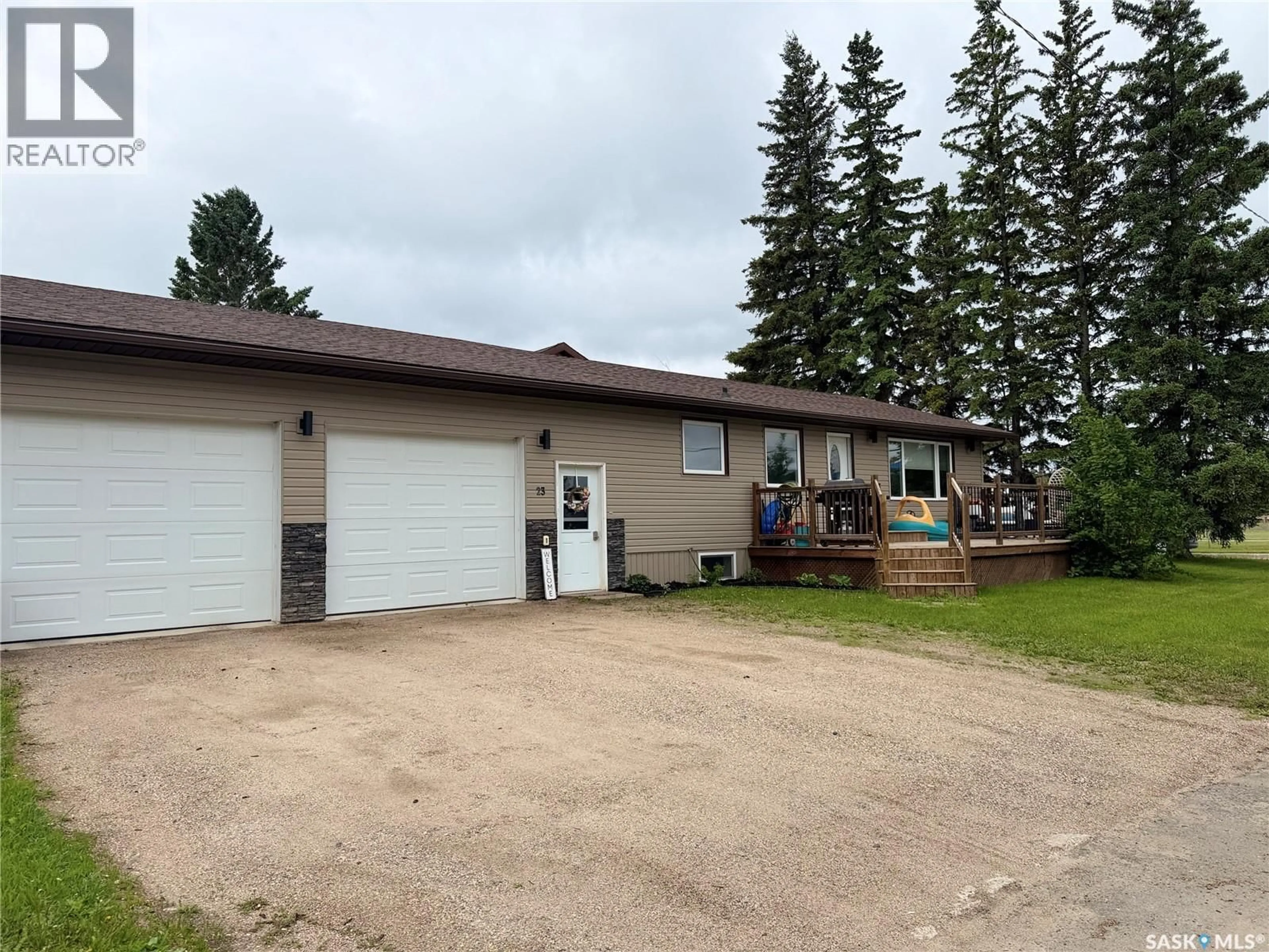 A pic from outside/outdoor area/front of a property/back of a property/a pic from drone, building for 23 WEXFORD STREET, Lanigan Saskatchewan S0K2M0