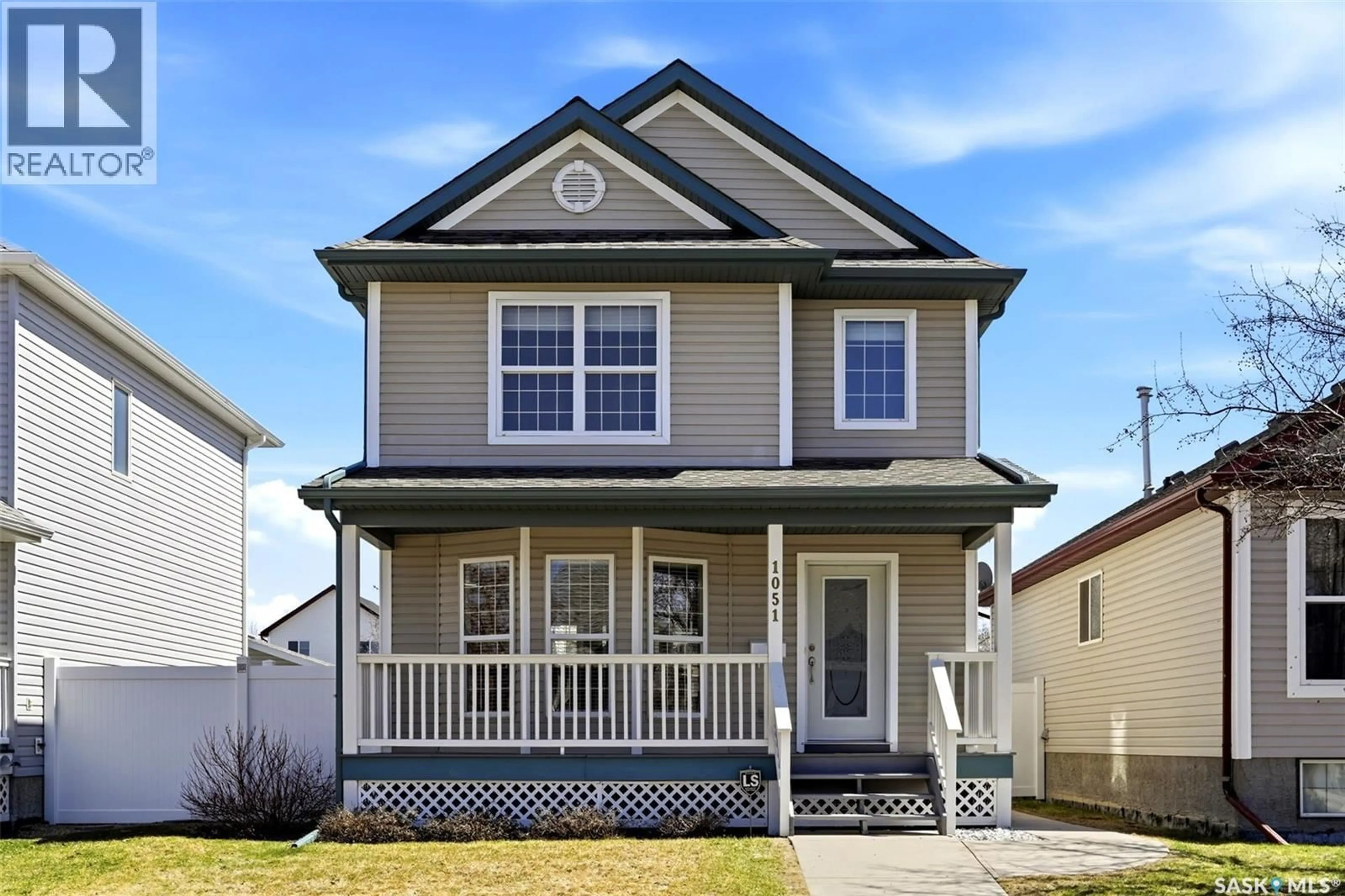 Home with vinyl exterior material, street for N - 1051 SNOWBERRY WAY, Regina Saskatchewan S4X4P5