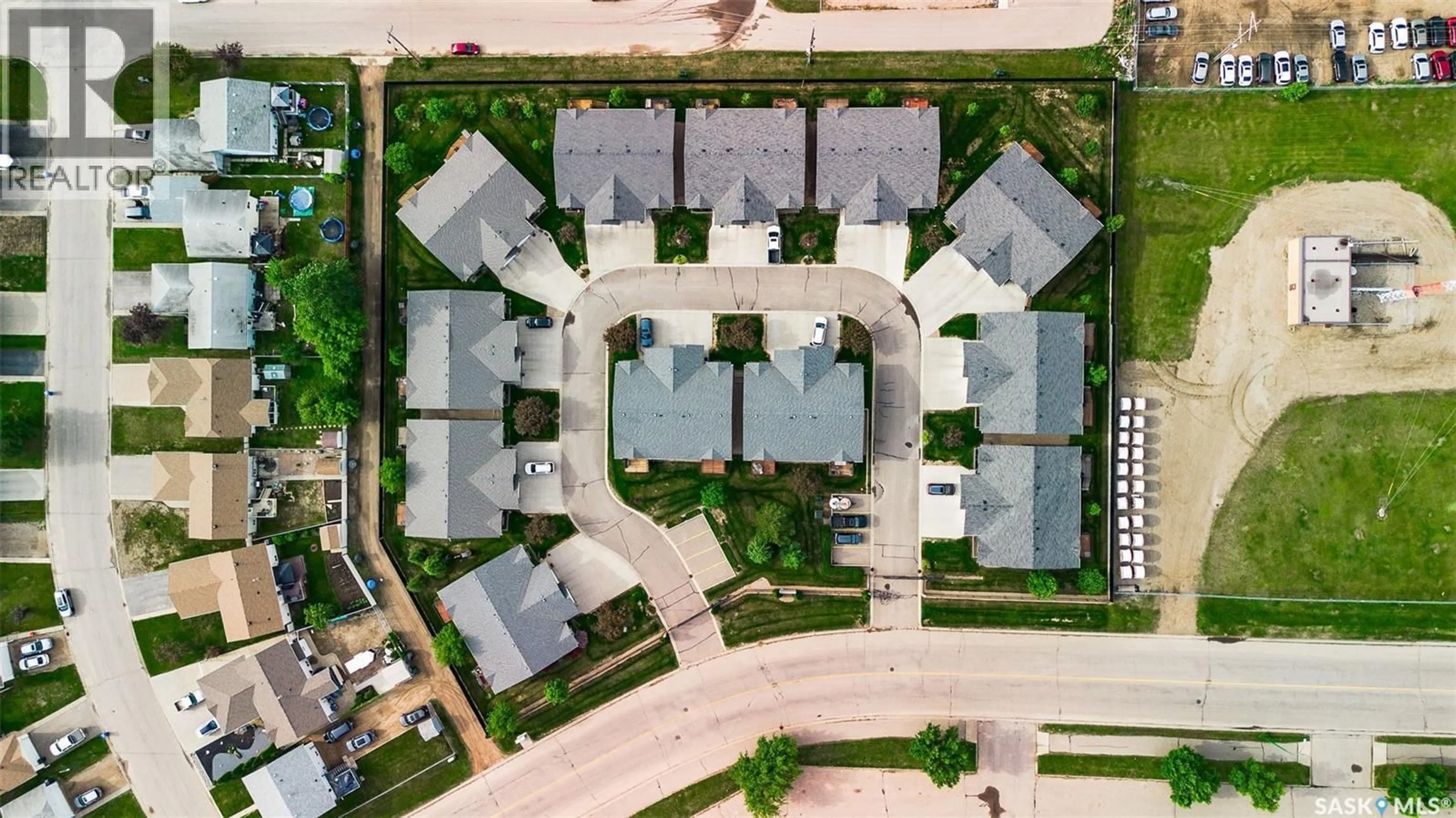 A pic from outside/outdoor area/front of a property/back of a property/a pic from drone, street for 17 550 SOUTHWOOD DRIVE, Prince Albert Saskatchewan S6V1G4