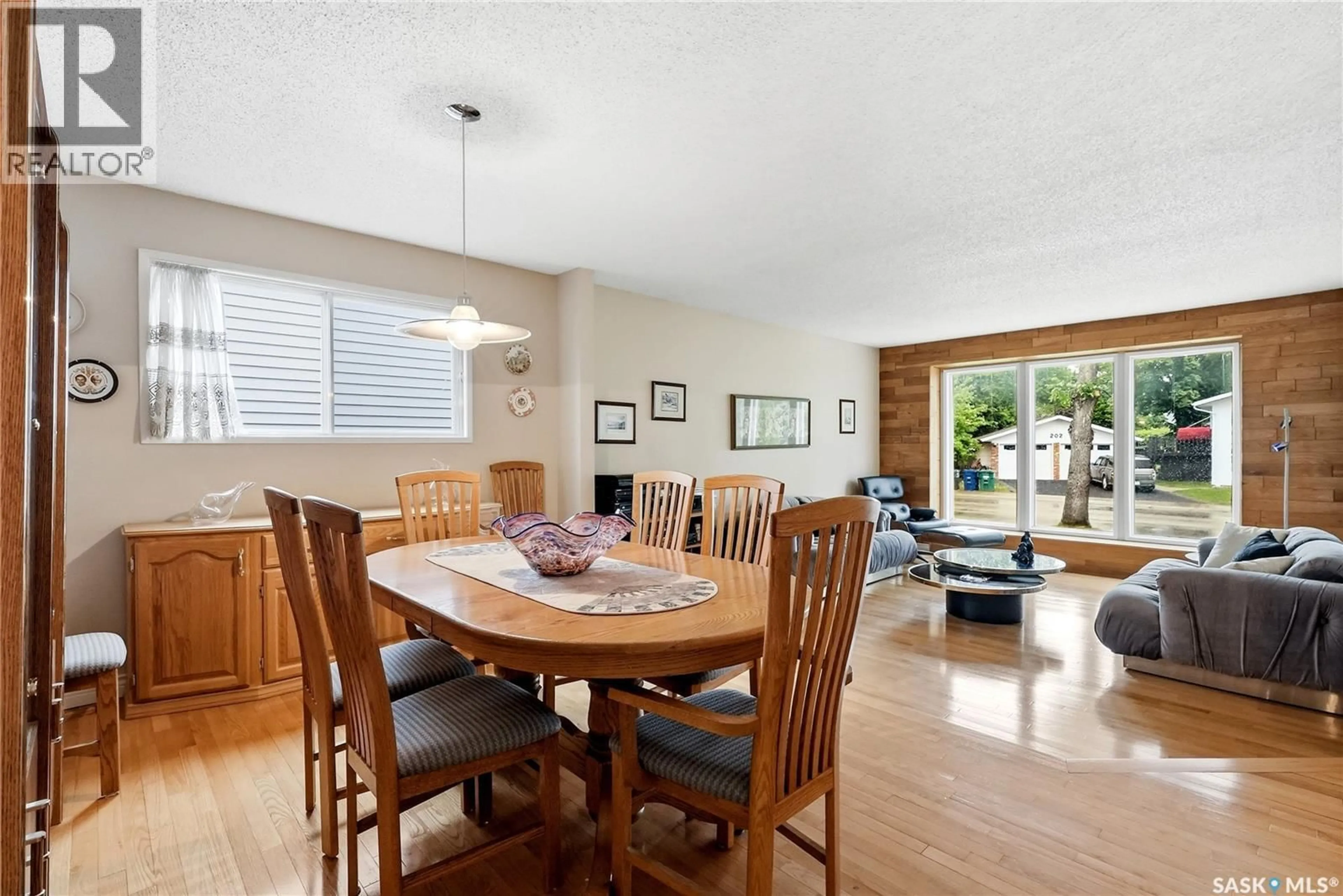 Dining room, wood/laminate floor for 131 NOKOMIS CRESCENT, Saskatoon Saskatchewan S7K5O9