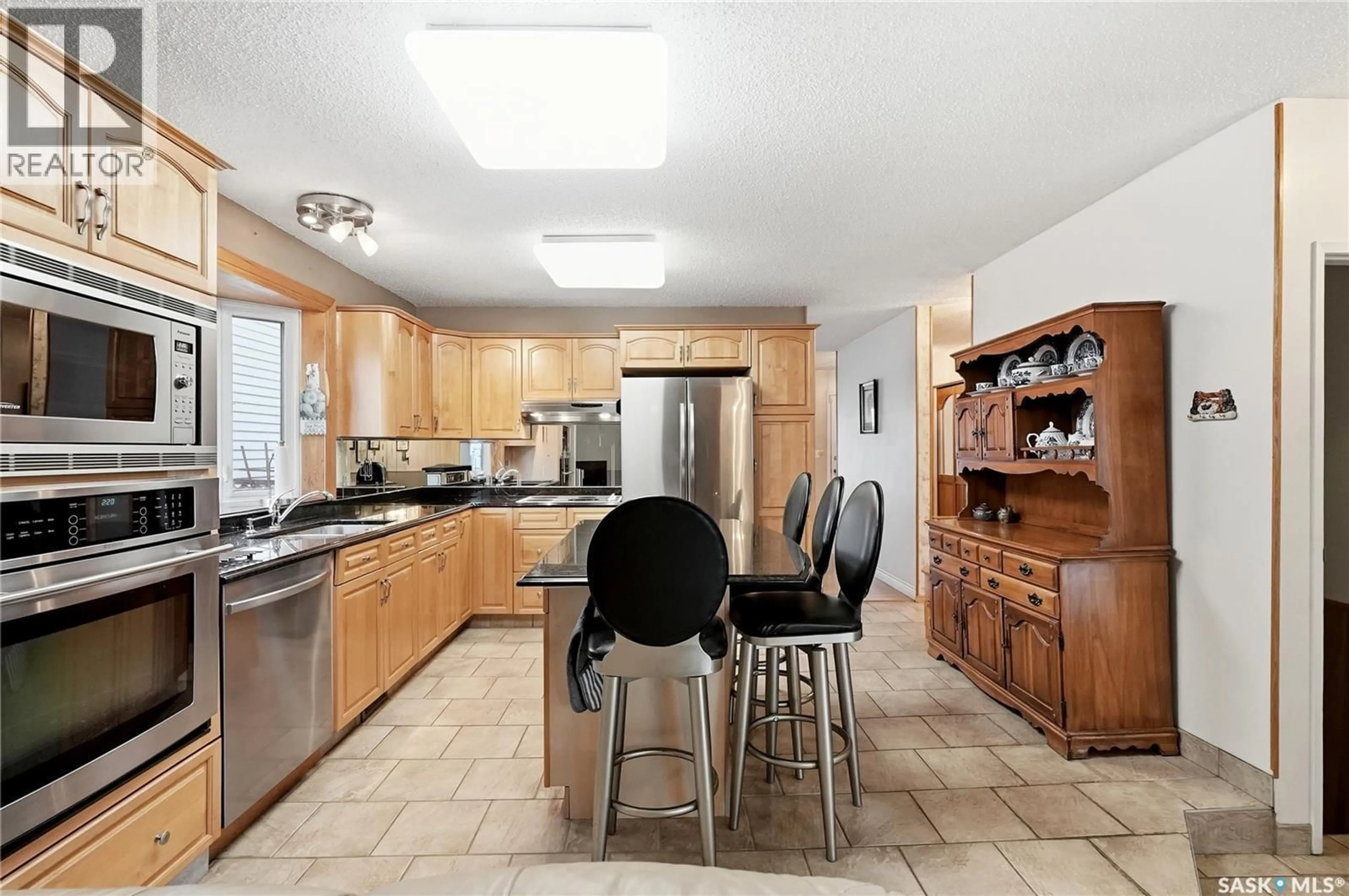Open concept kitchen, ceramic/tile floor for 131 NOKOMIS CRESCENT, Saskatoon Saskatchewan S7K5O9