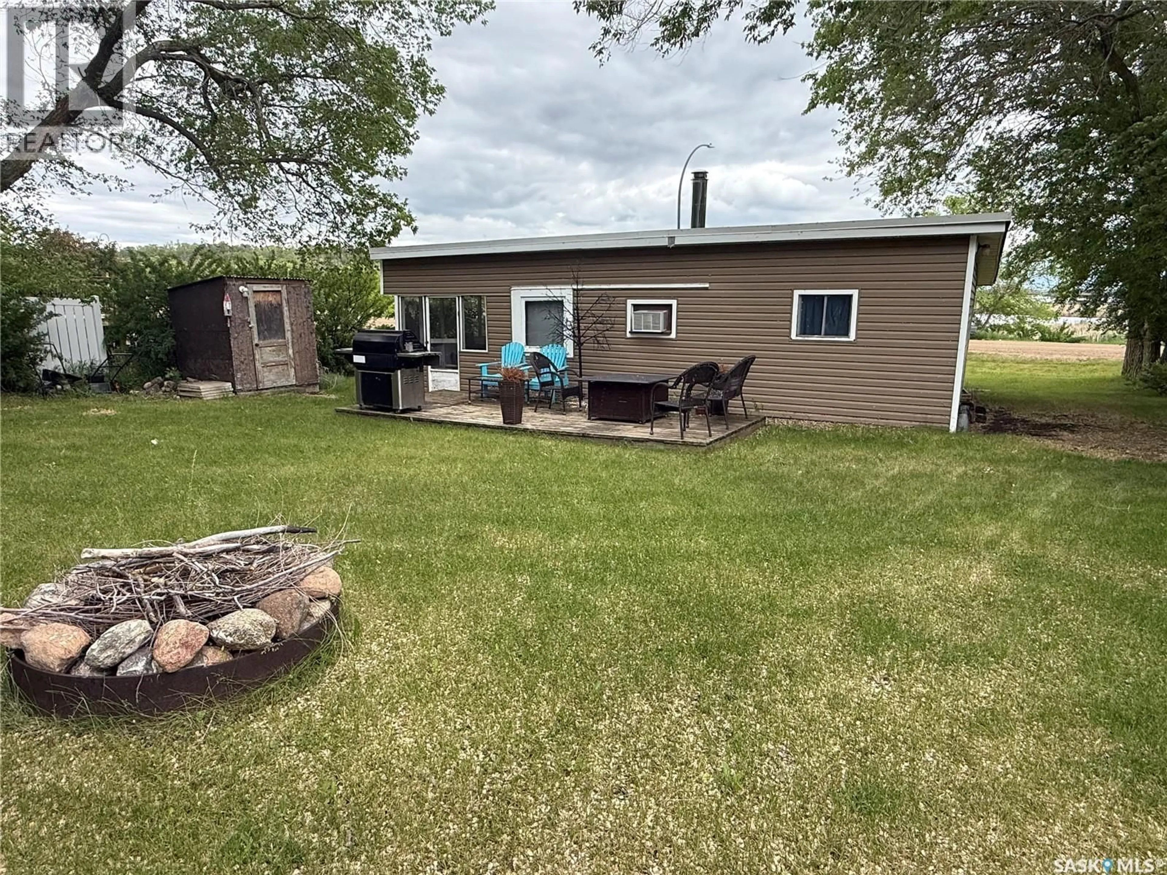 A pic from outside/outdoor area/front of a property/back of a property/a pic from drone, water/lake/river/ocean view for 12 CANARY DRIVE, Glen Harbour Saskatchewan S0G4L0