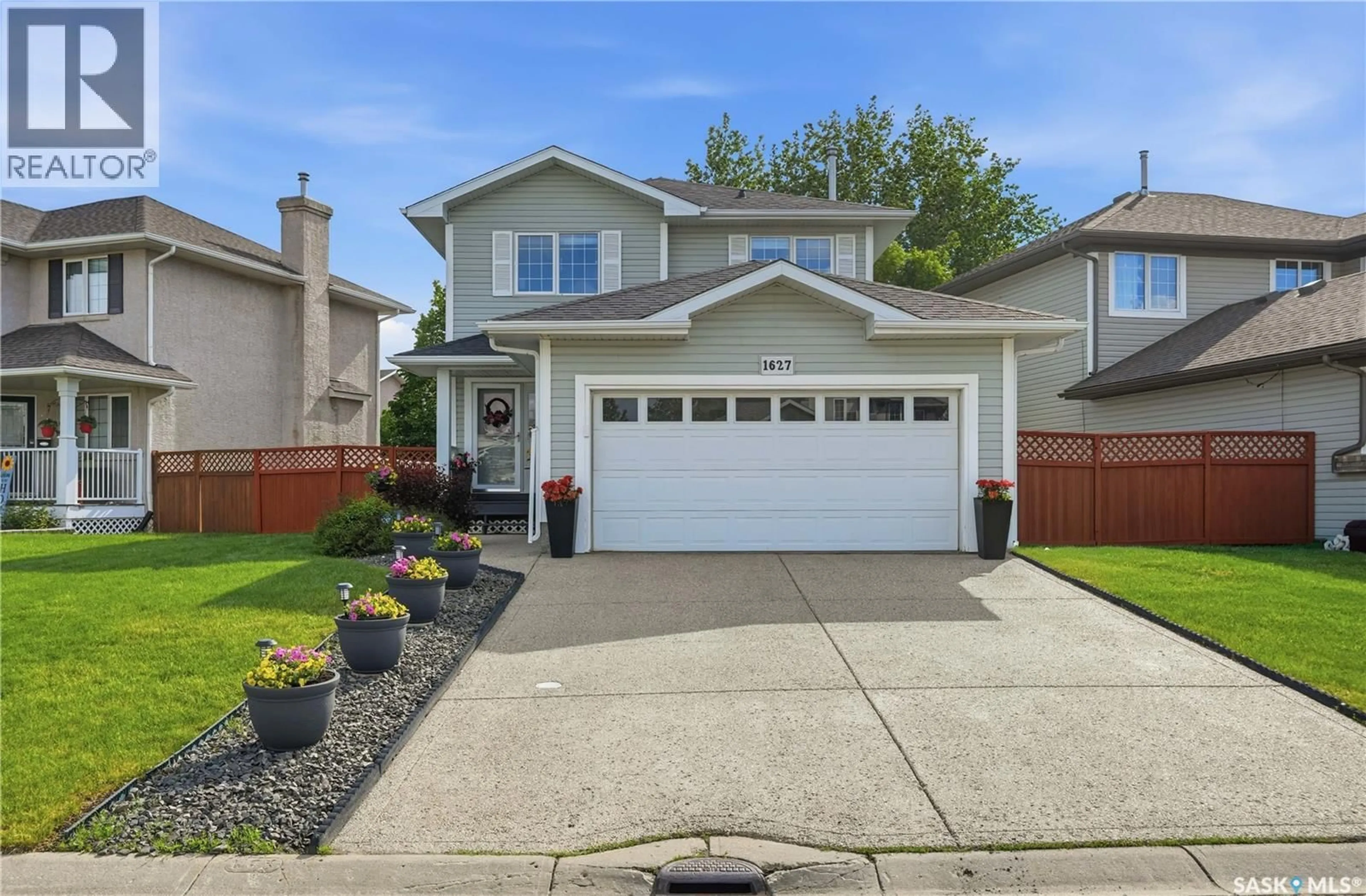 Home with vinyl exterior material, street for 1627 WINGERT DRIVE, Regina Saskatchewan S4X4P9