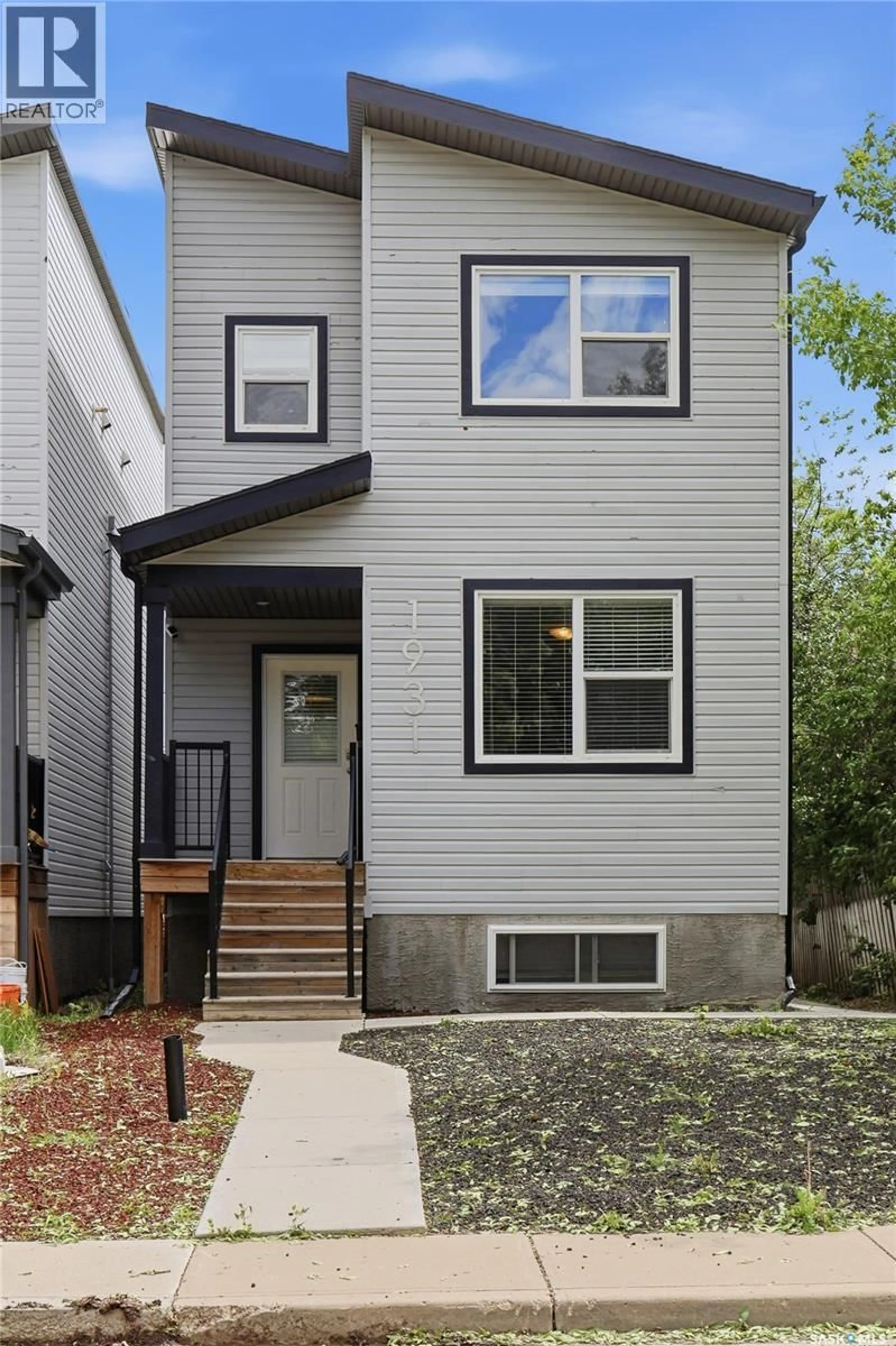 Home with vinyl exterior material, street for A & B - 1931 CONNAUGHT STREET, Regina Saskatchewan S4T4T6