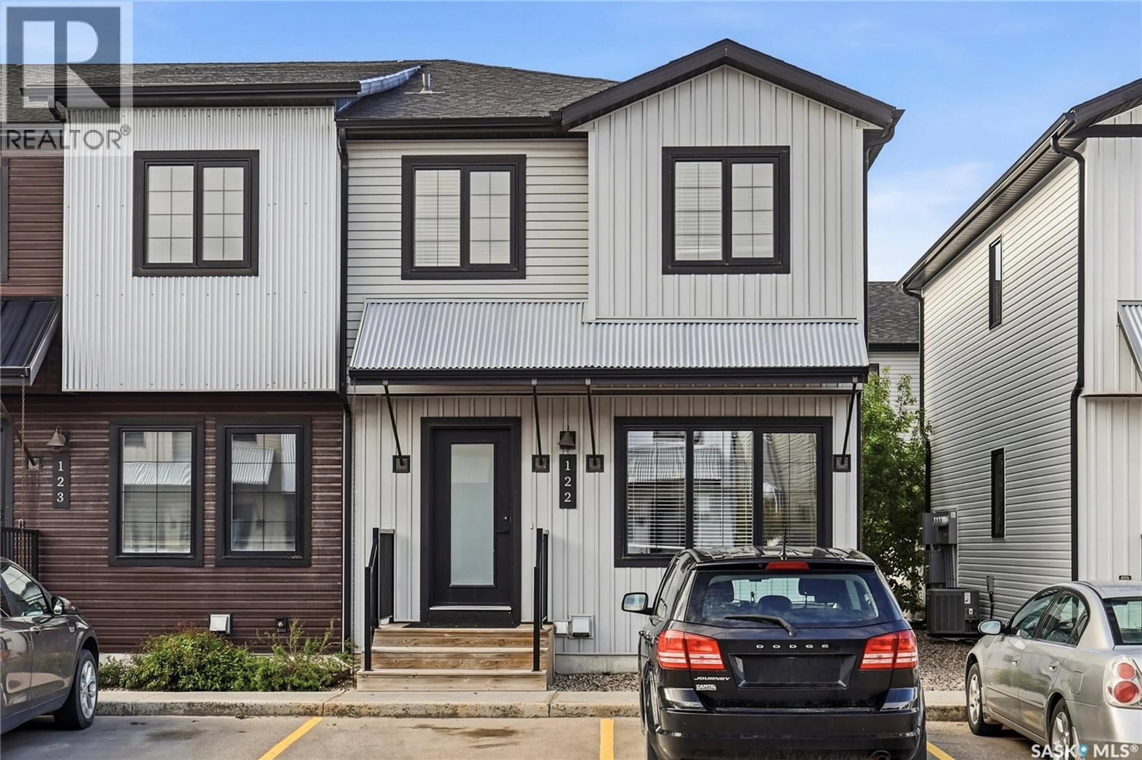 Home with vinyl exterior material, street for 122 2715 NARCISSE DRIVE, Regina Saskatchewan S4X0P8