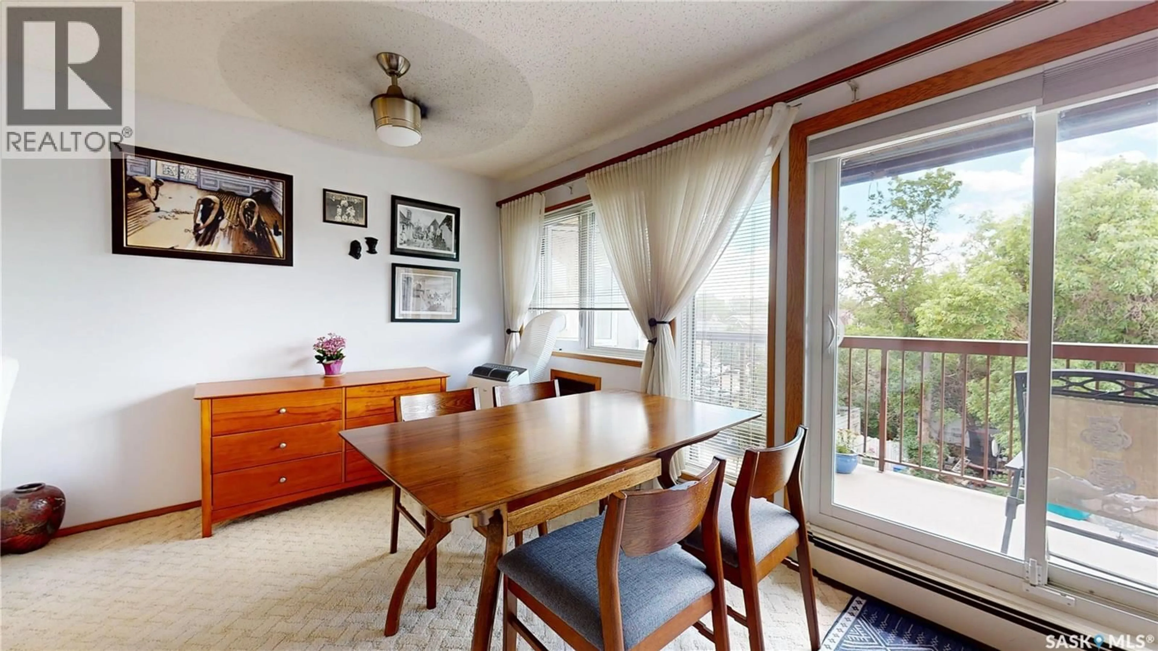 Dining room, wood/laminate floor for 309 2727 VICTORIA AVENUE, Regina Saskatchewan S4T1K4
