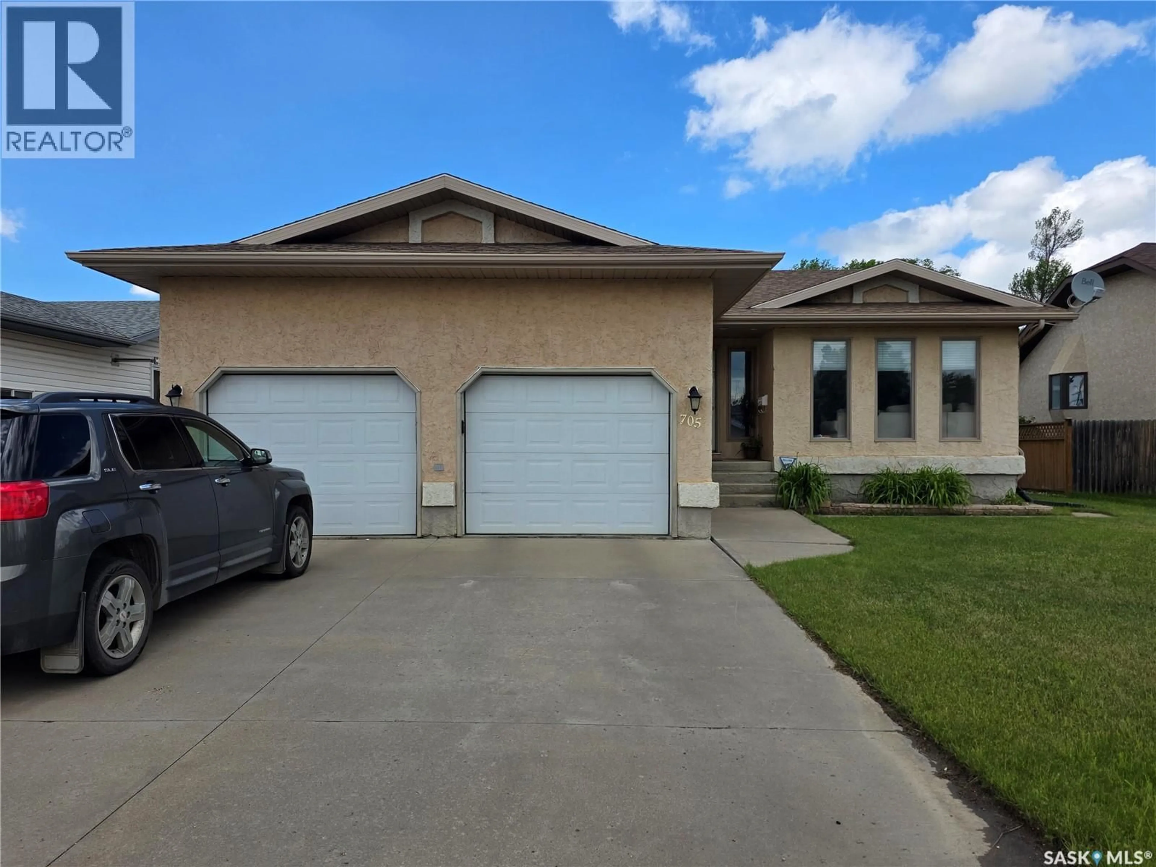 Home with vinyl exterior material, street for 705 SUN VALLEY DRIVE, Estevan Saskatchewan S4A2R1