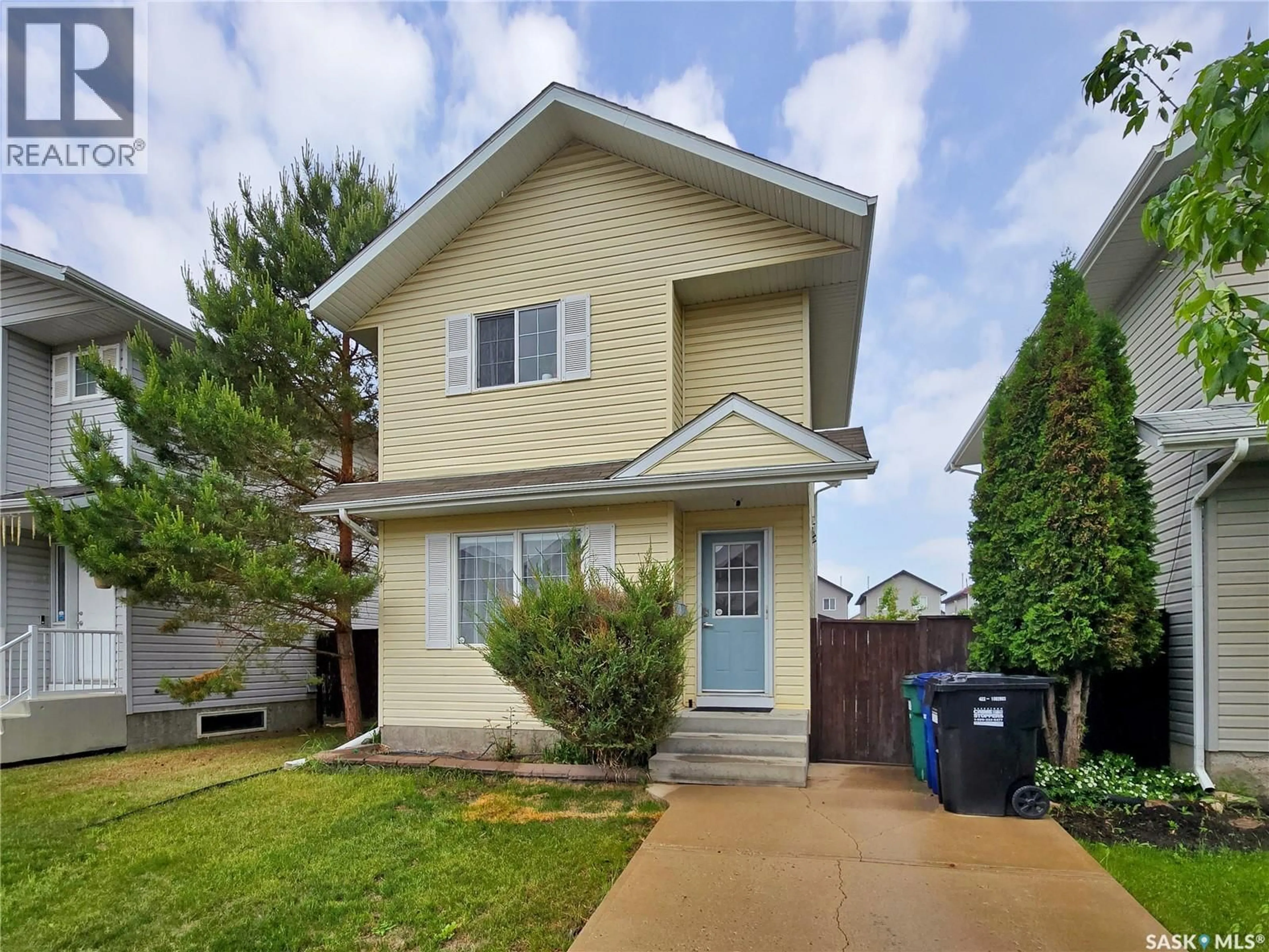 Home with vinyl exterior material, street for 122 BLAKENEY CRESCENT, Saskatoon Saskatchewan S7L7N4