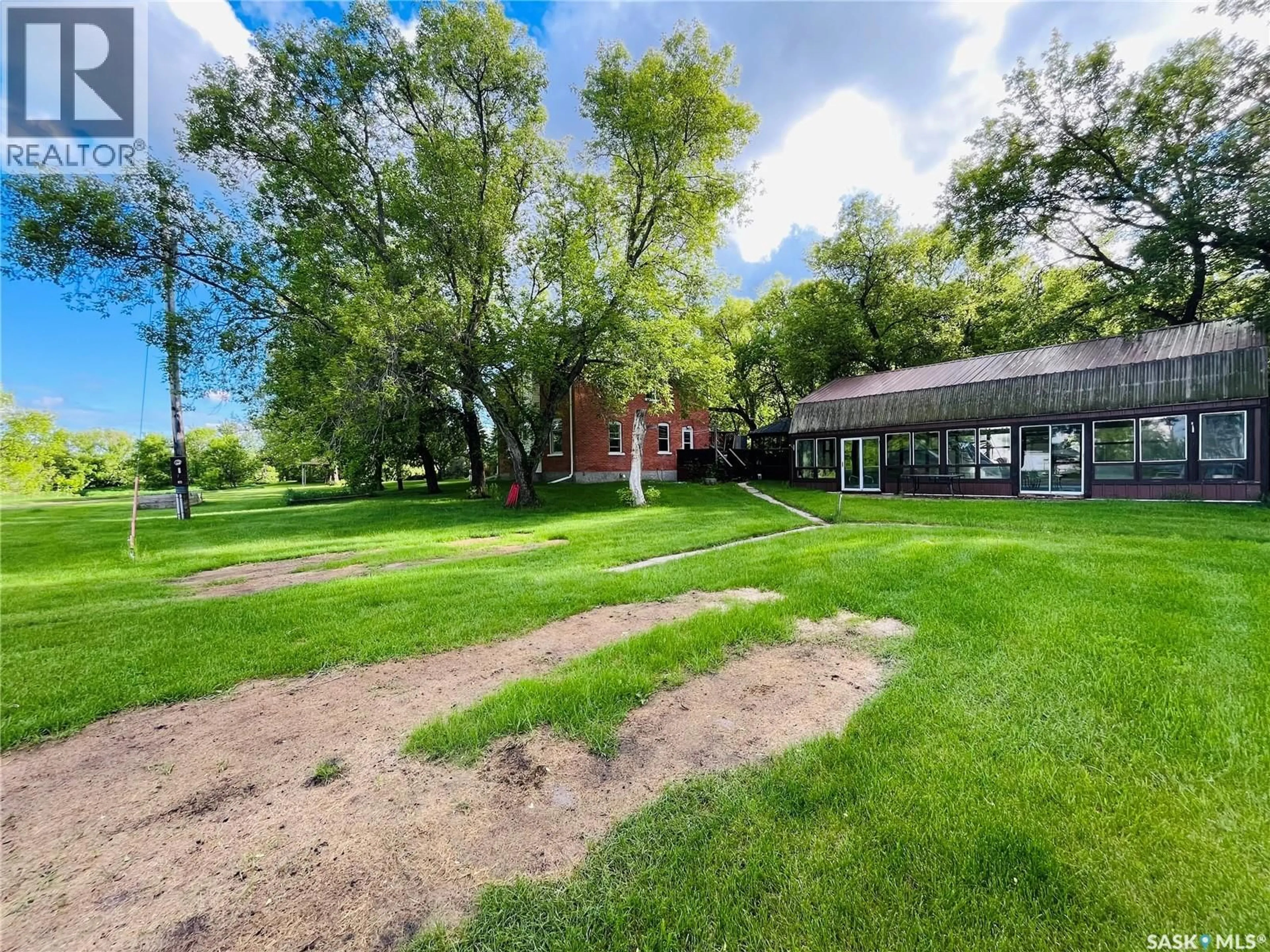 A pic from outside/outdoor area/front of a property/back of a property/a pic from drone, unknown for TRIM ACREAGE, Rocanville Rm No. 151 Saskatchewan S0A3L0