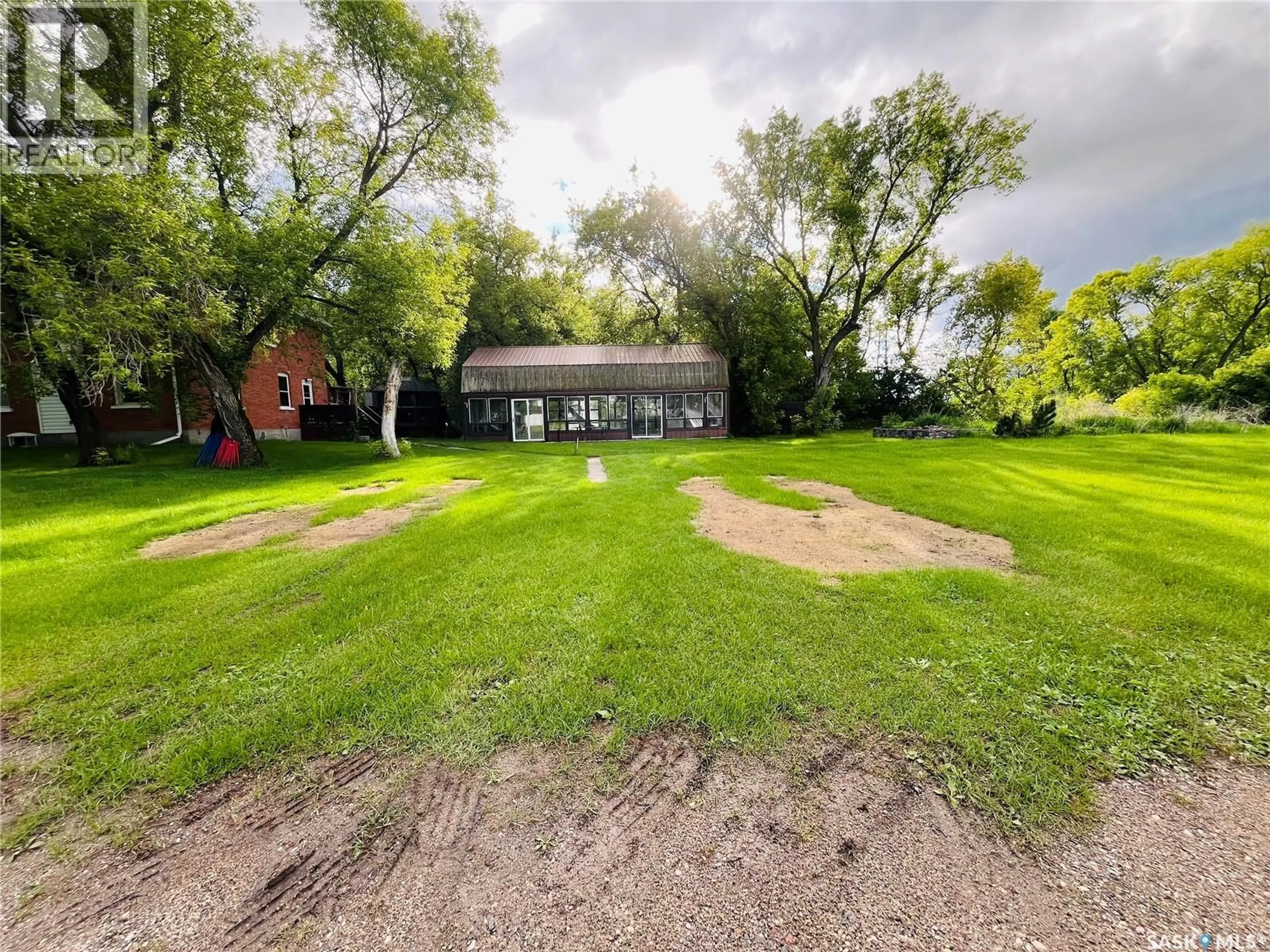 A pic from outside/outdoor area/front of a property/back of a property/a pic from drone, street for TRIM ACREAGE, Rocanville Rm No. 151 Saskatchewan S0A3L0
