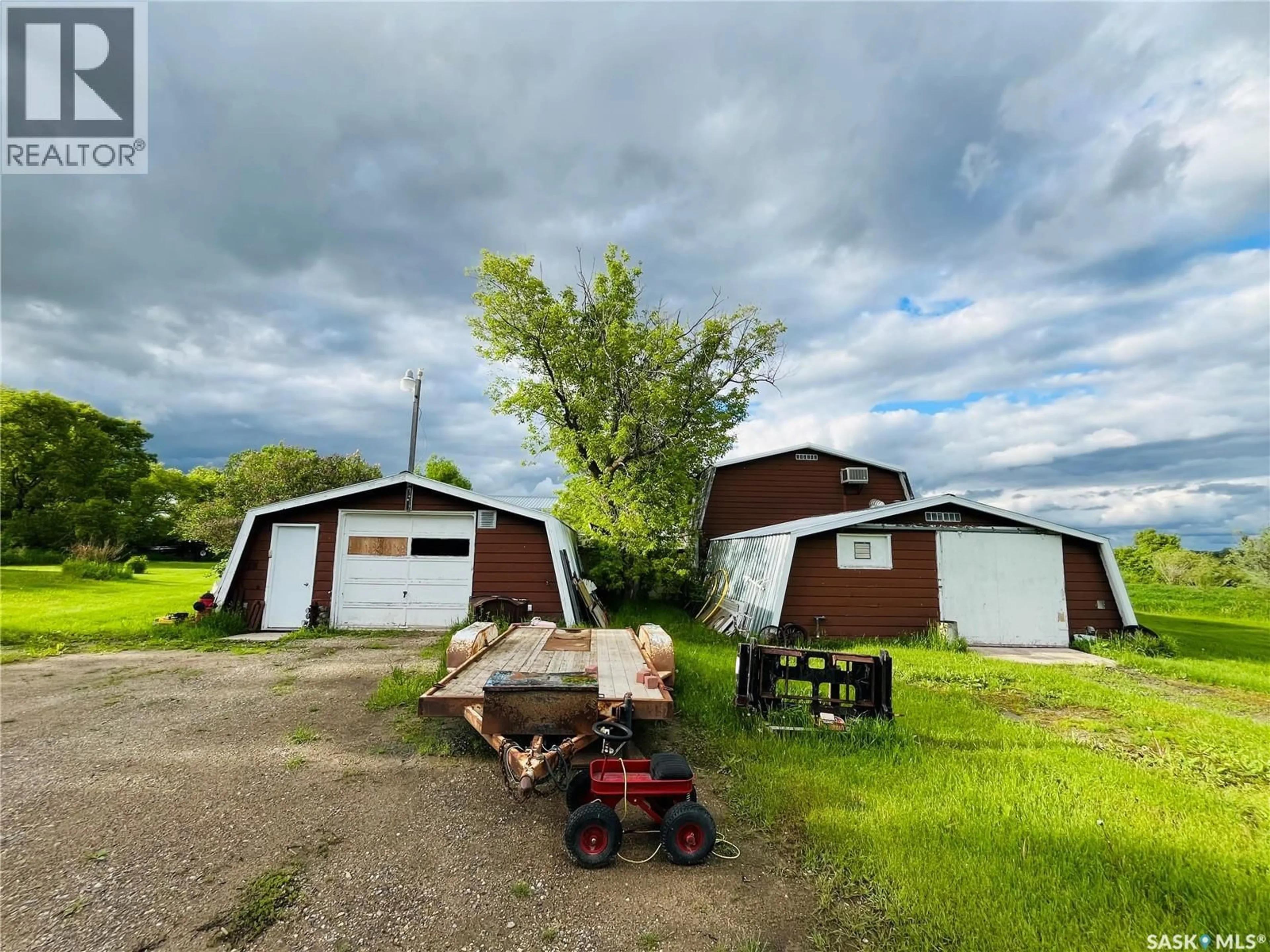A pic from outside/outdoor area/front of a property/back of a property/a pic from drone, street for TRIM ACREAGE, Rocanville Rm No. 151 Saskatchewan S0A3L0