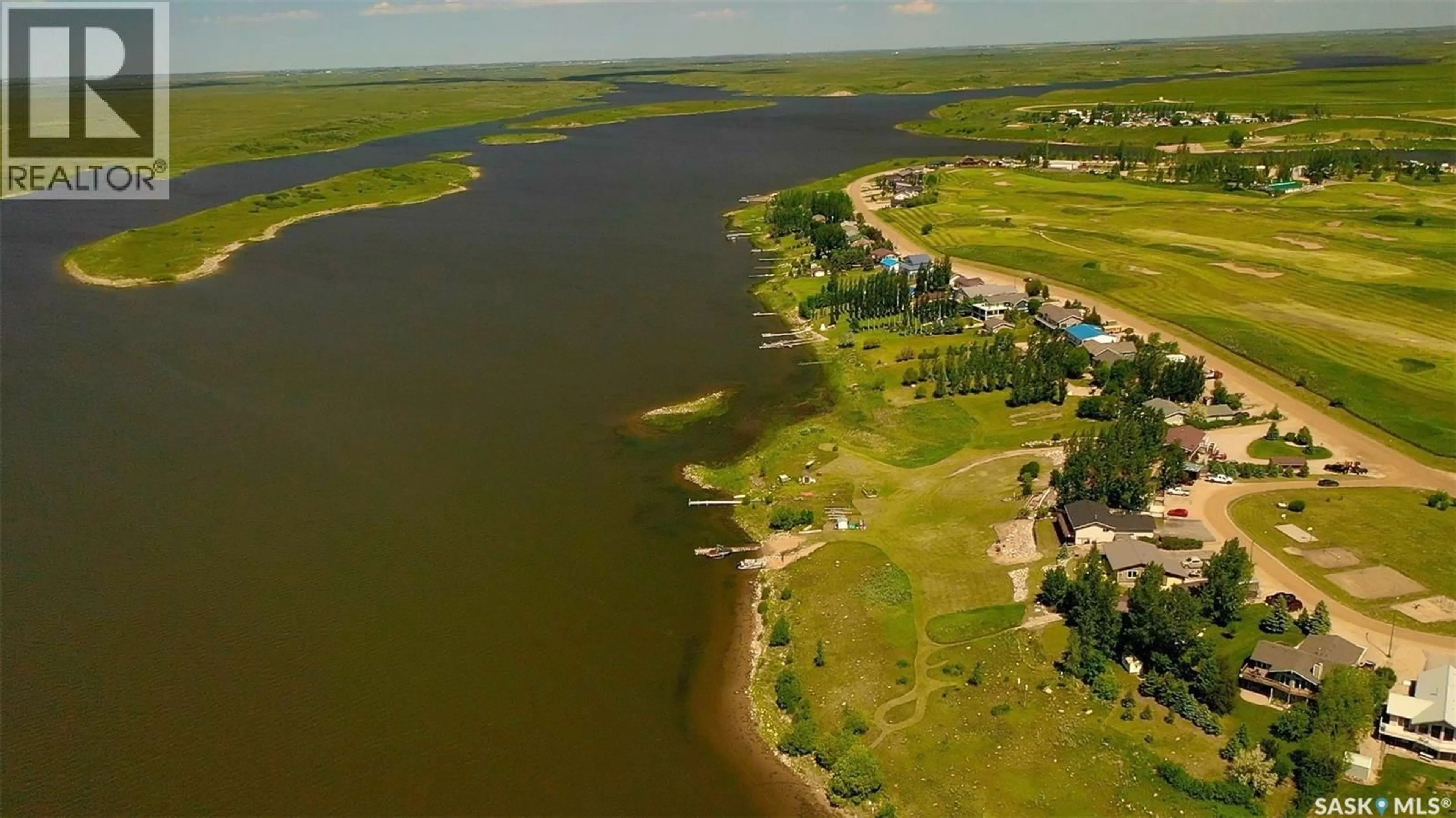 A pic from outside/outdoor area/front of a property/back of a property/a pic from drone, water/lake/river/ocean view for 20 HARBOUR VIEW DRIVE, Cymri Rm No. 36 Saskatchewan S0C1S0