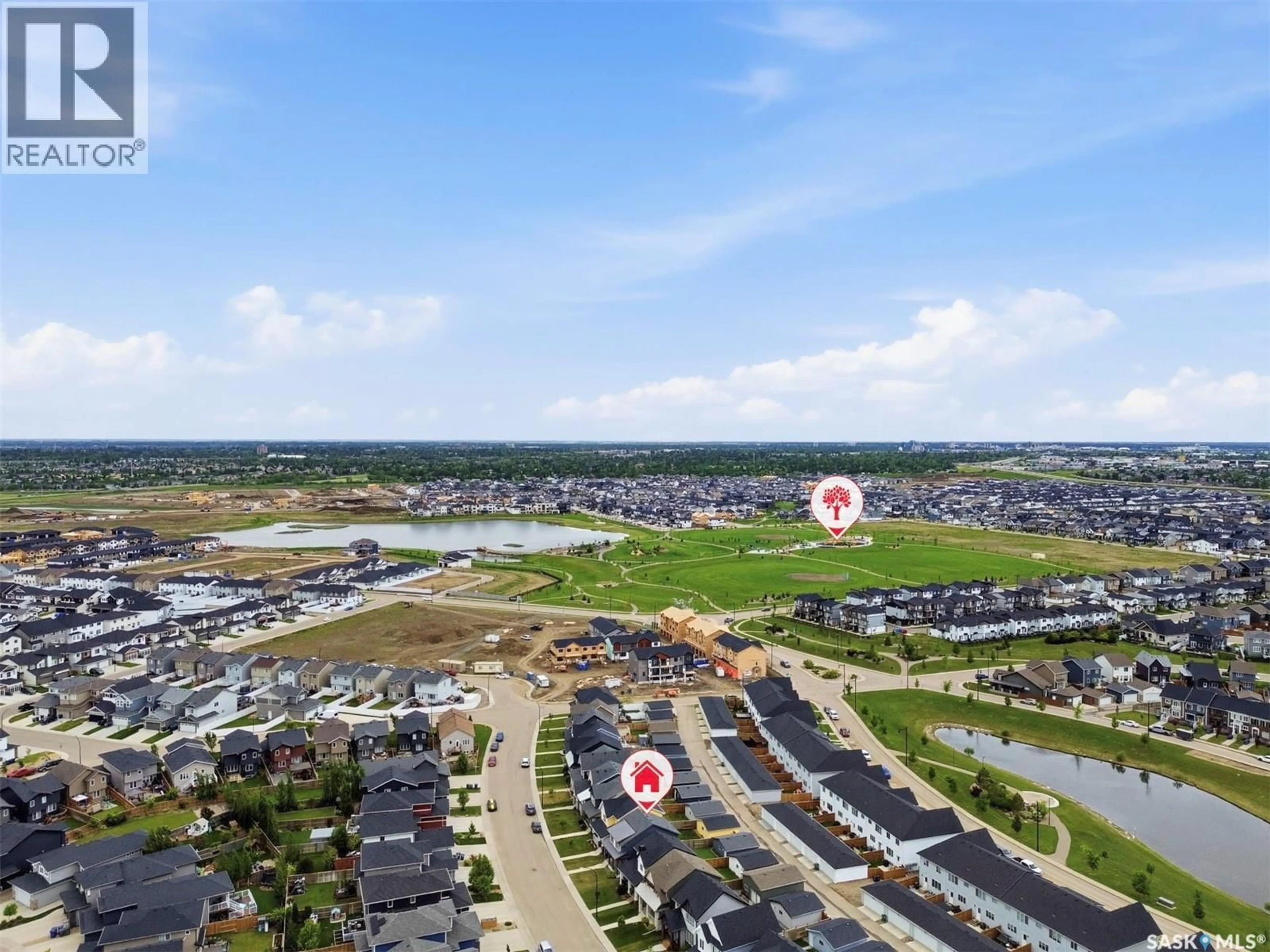 A pic from outside/outdoor area/front of a property/back of a property/a pic from drone, water/lake/river/ocean view for 251 NEWTON LINK, Saskatoon Saskatchewan S7V0M8