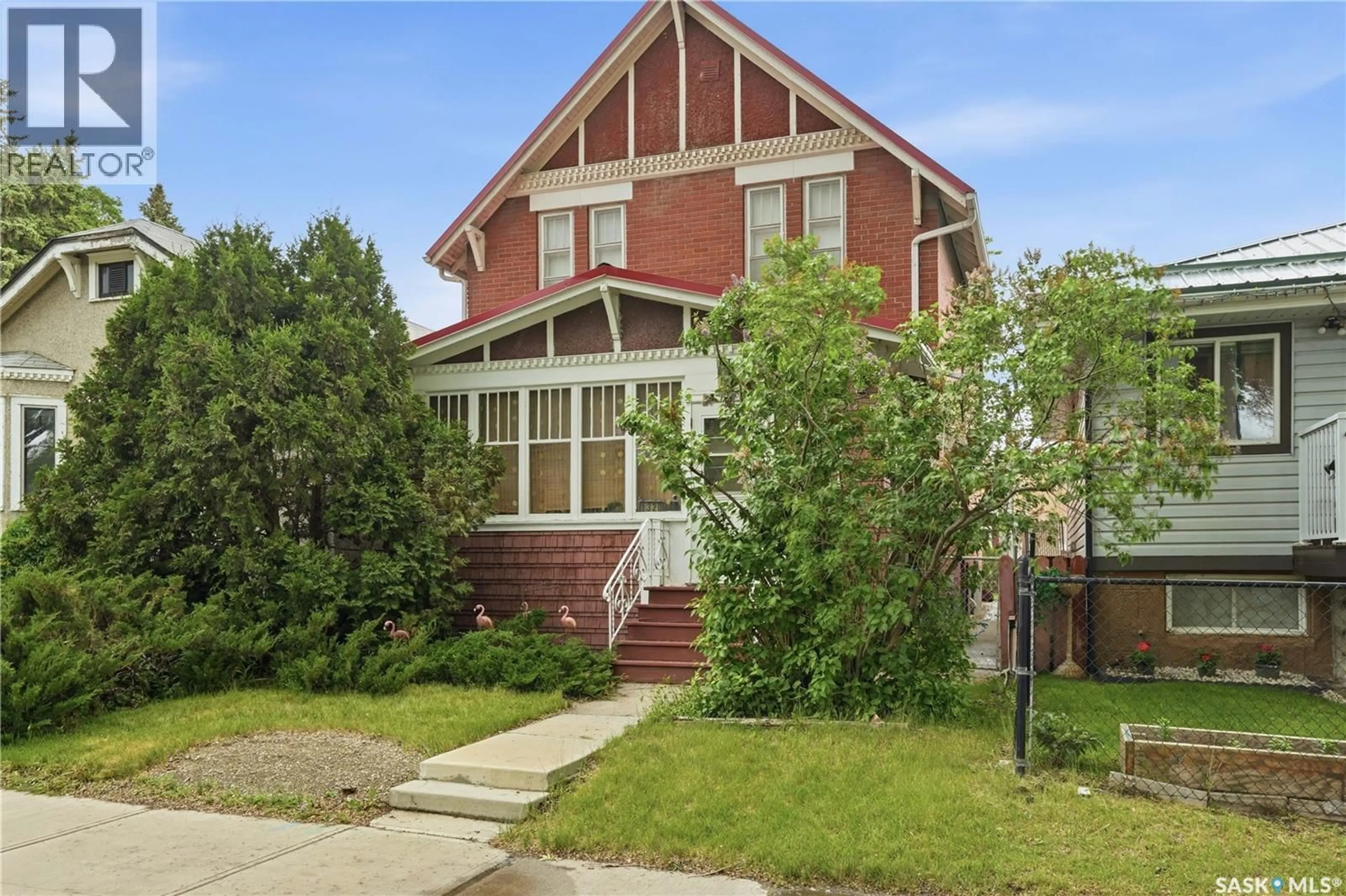 Home with brick exterior material, street for 1320 VICTORIA AVENUE, Regina Saskatchewan S4P0P1