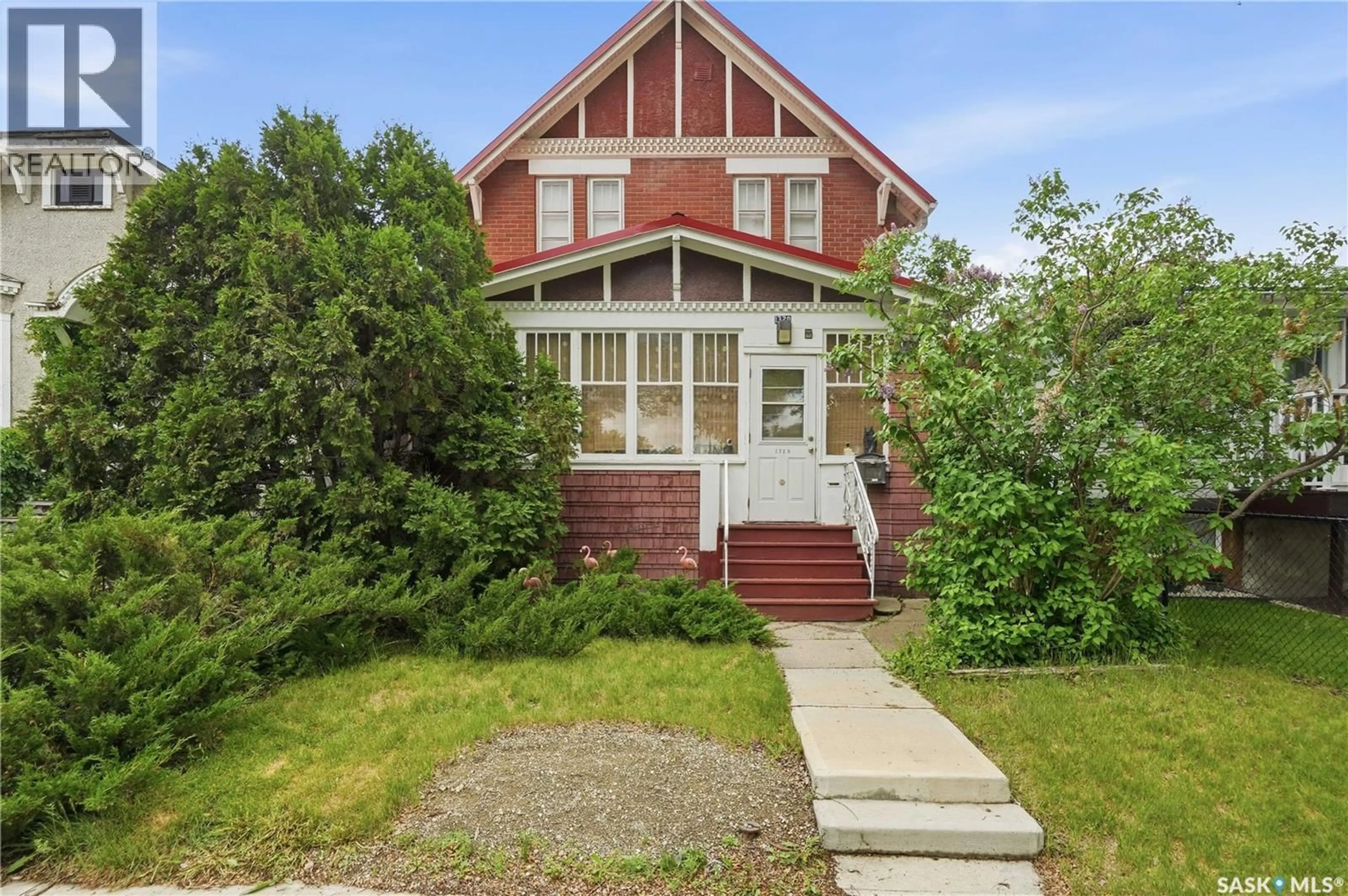 Home with brick exterior material, street for 1320 VICTORIA AVENUE, Regina Saskatchewan S4P0P1