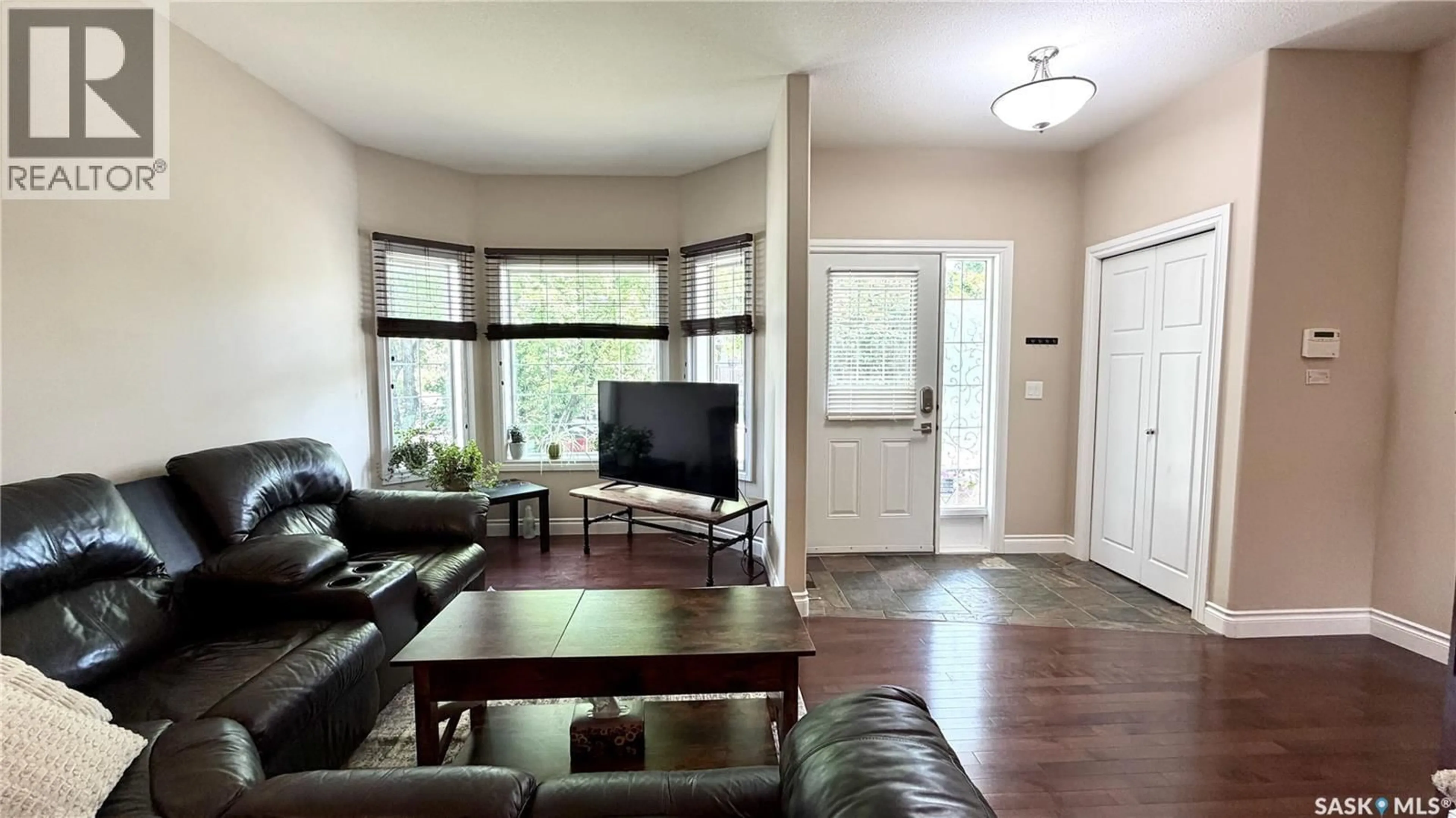 Living room with furniture, unknown for 1233 13TH STREET, Saskatoon Saskatchewan S7H0C3