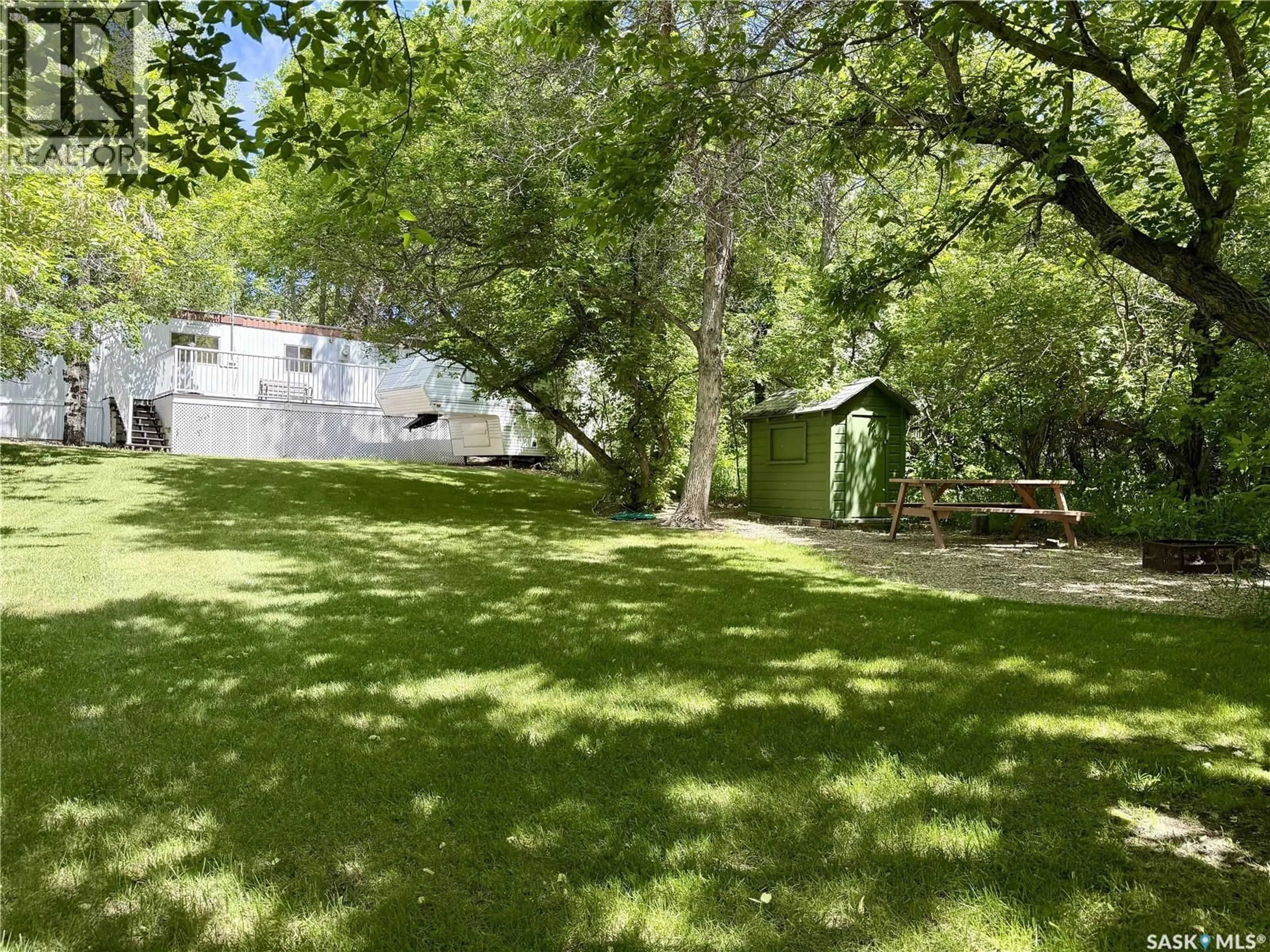 A pic from outside/outdoor area/front of a property/back of a property/a pic from drone, forest/trees view for 71 CANARY DRIVE, Glen Harbour Saskatchewan S0G4L0