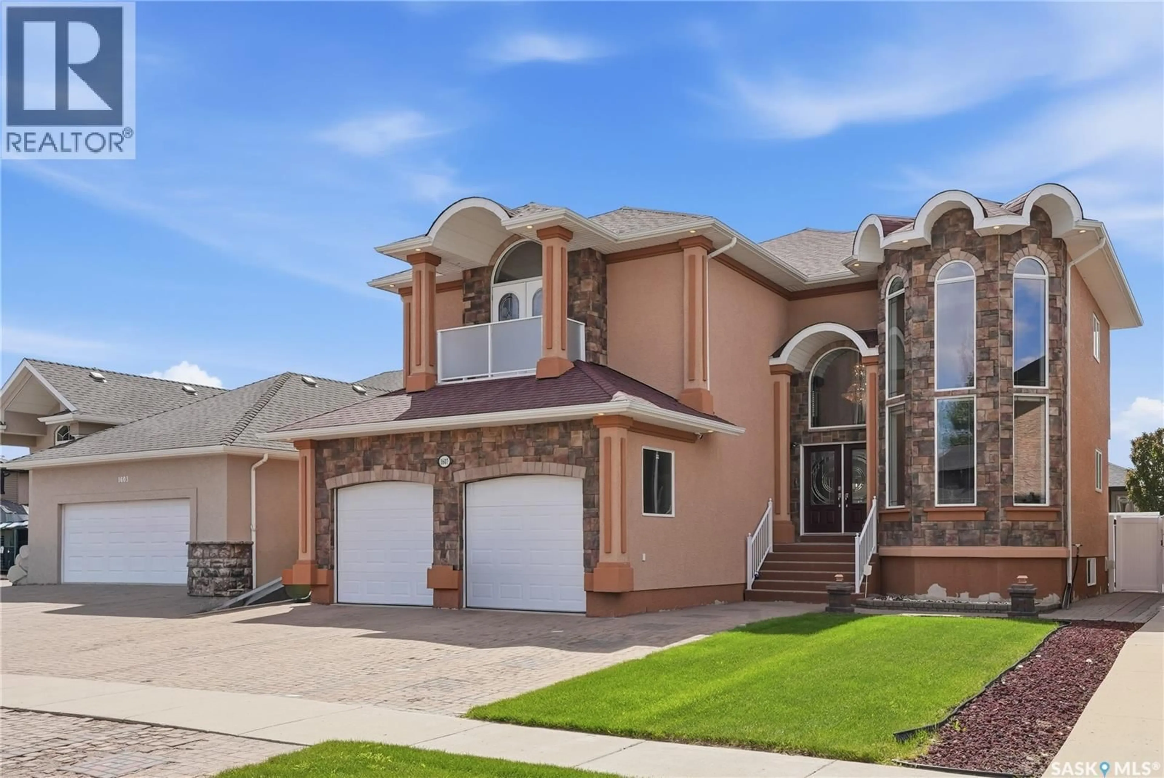 Home with brick exterior material, street for 1607 STENSRUD ROAD, Saskatoon Saskatchewan S7W0C5