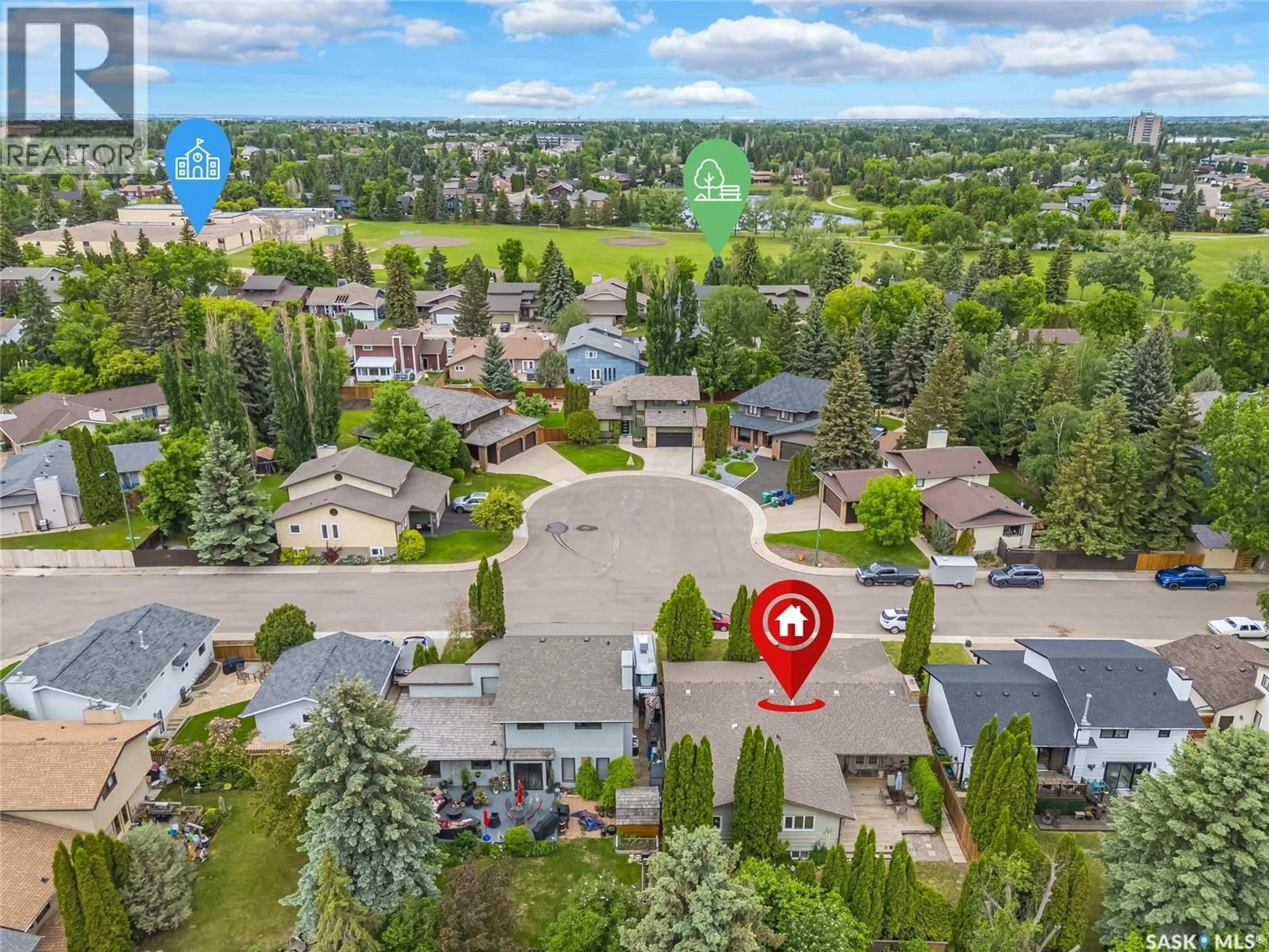 A pic from outside/outdoor area/front of a property/back of a property/a pic from drone, street for 330 WHITESHORE WAY, Saskatoon Saskatchewan S7J4C2