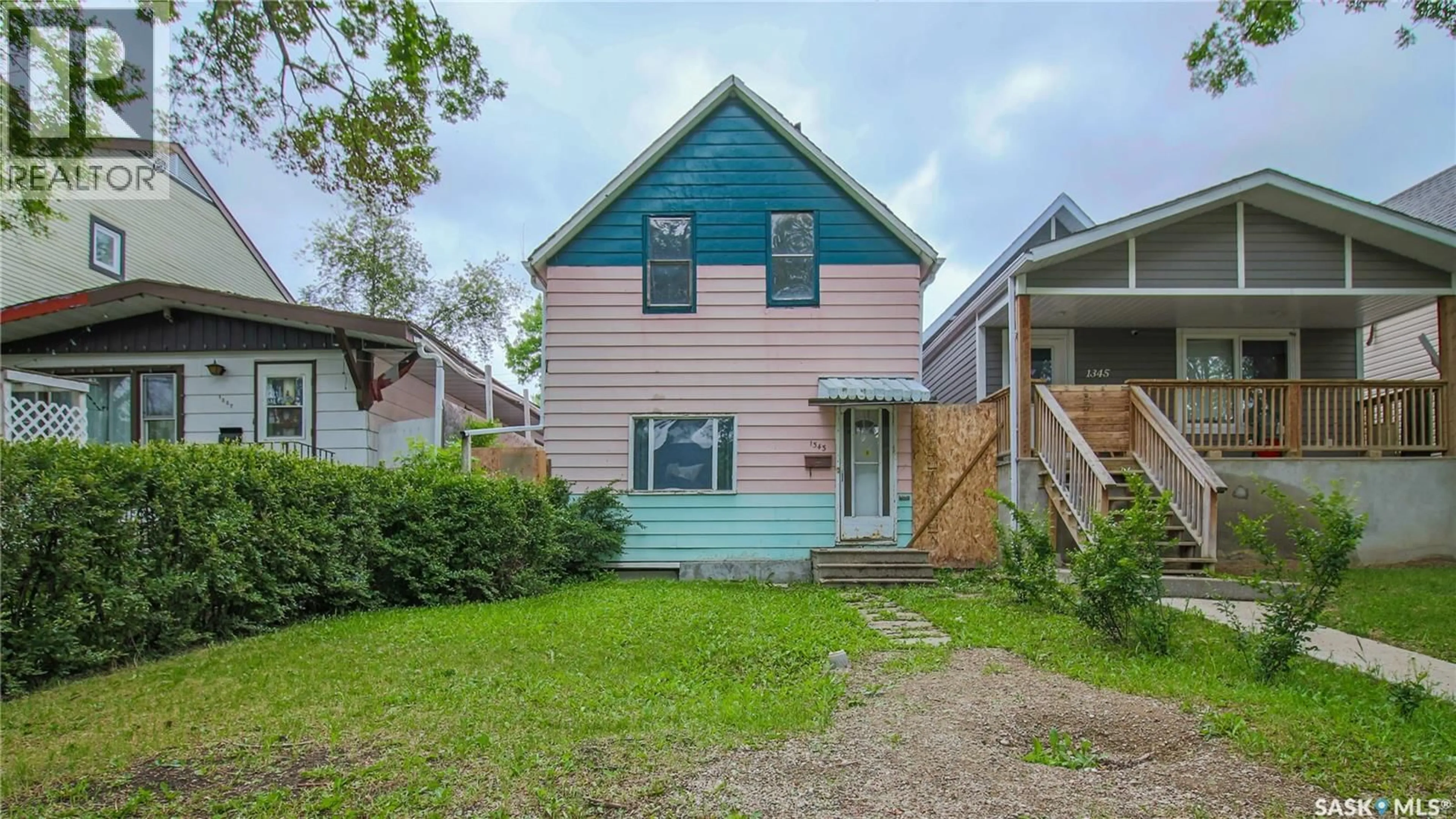 Home with vinyl exterior material, street for 1343 RAE STREET, Regina Saskatchewan S4T2C4