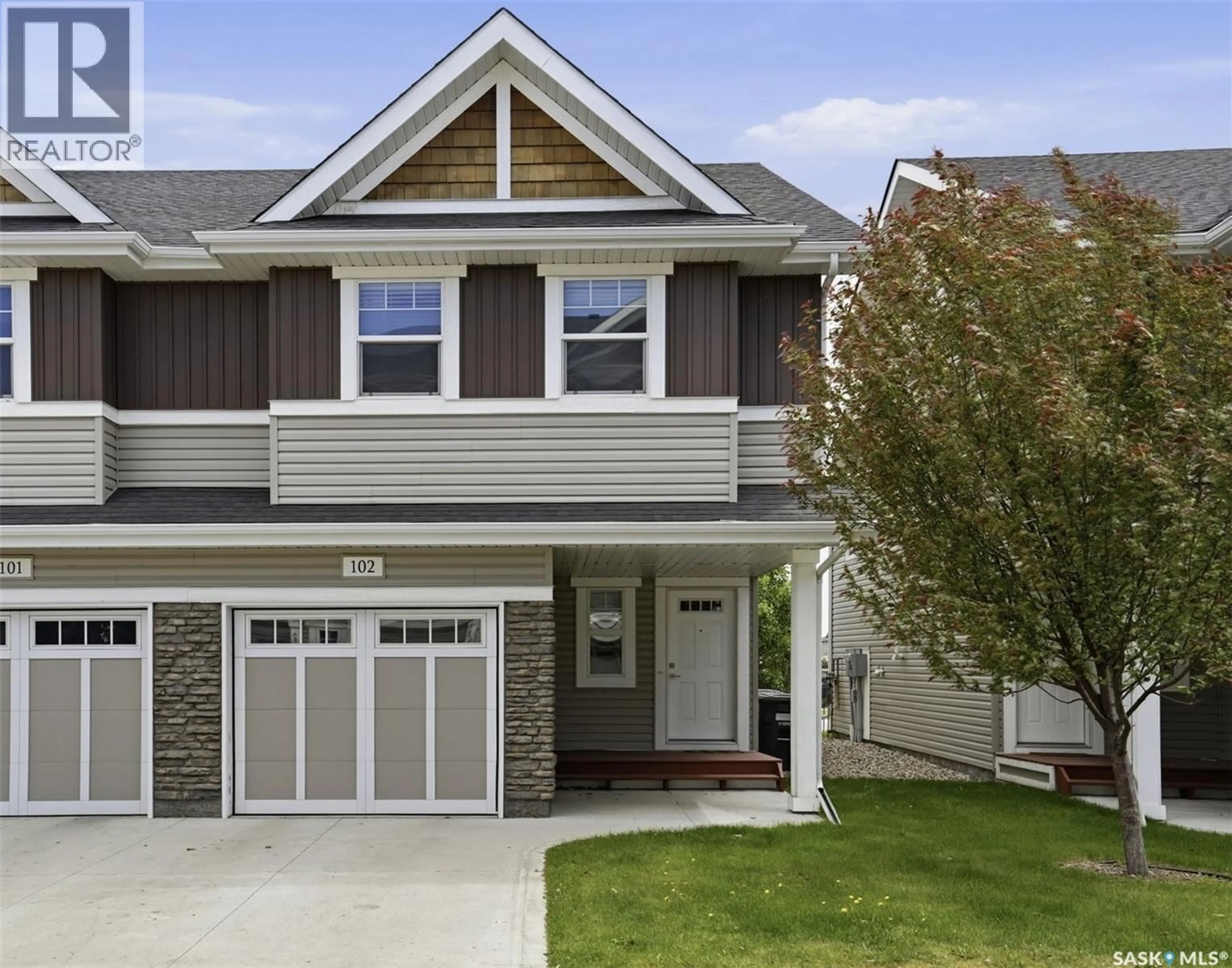 Home with vinyl exterior material, street for 315 - 102 DICKSON CRESCENT, Saskatoon Saskatchewan S7T0T8