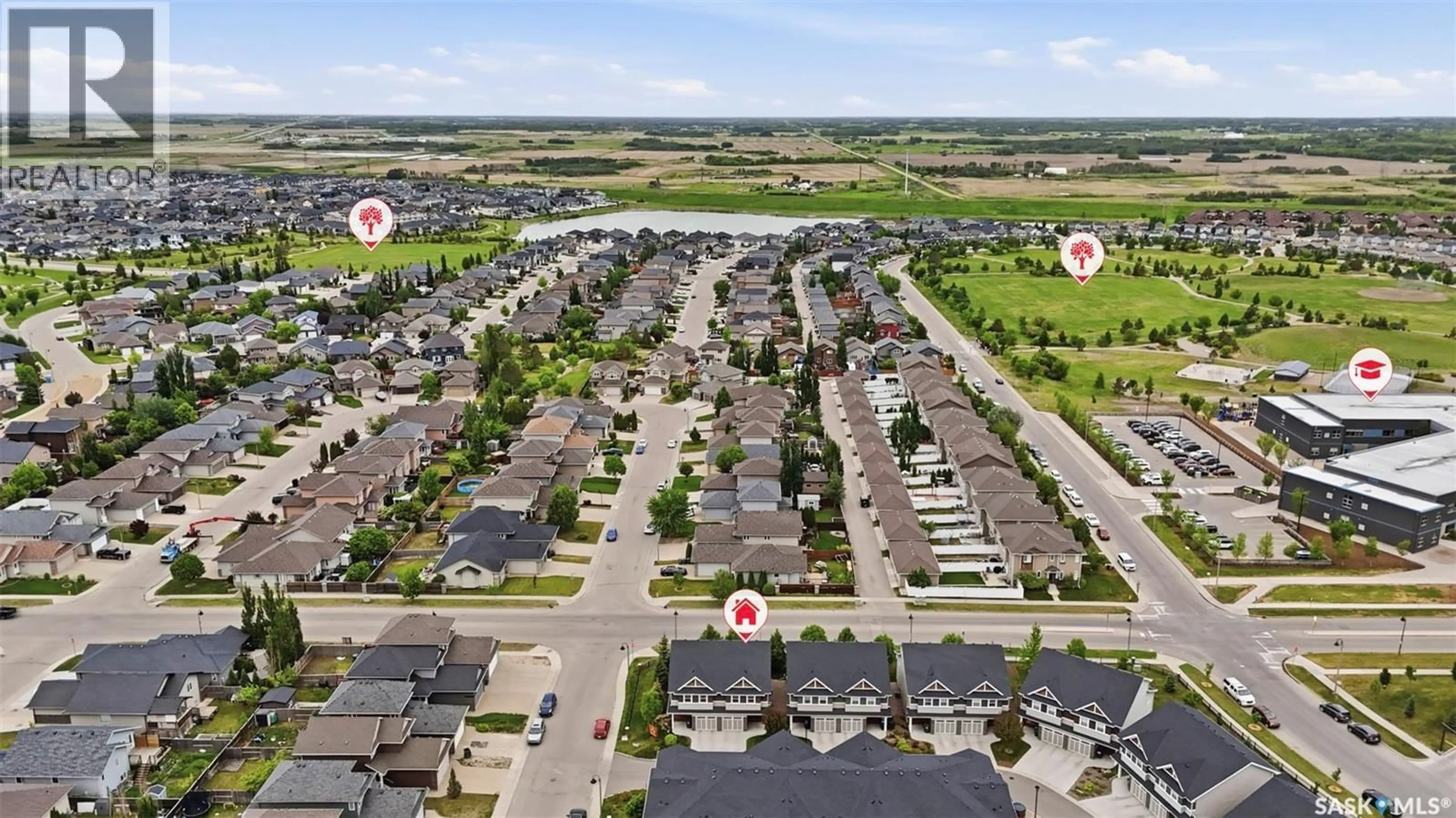 A pic from outside/outdoor area/front of a property/back of a property/a pic from drone, street for 315 - 102 DICKSON CRESCENT, Saskatoon Saskatchewan S7T0T8