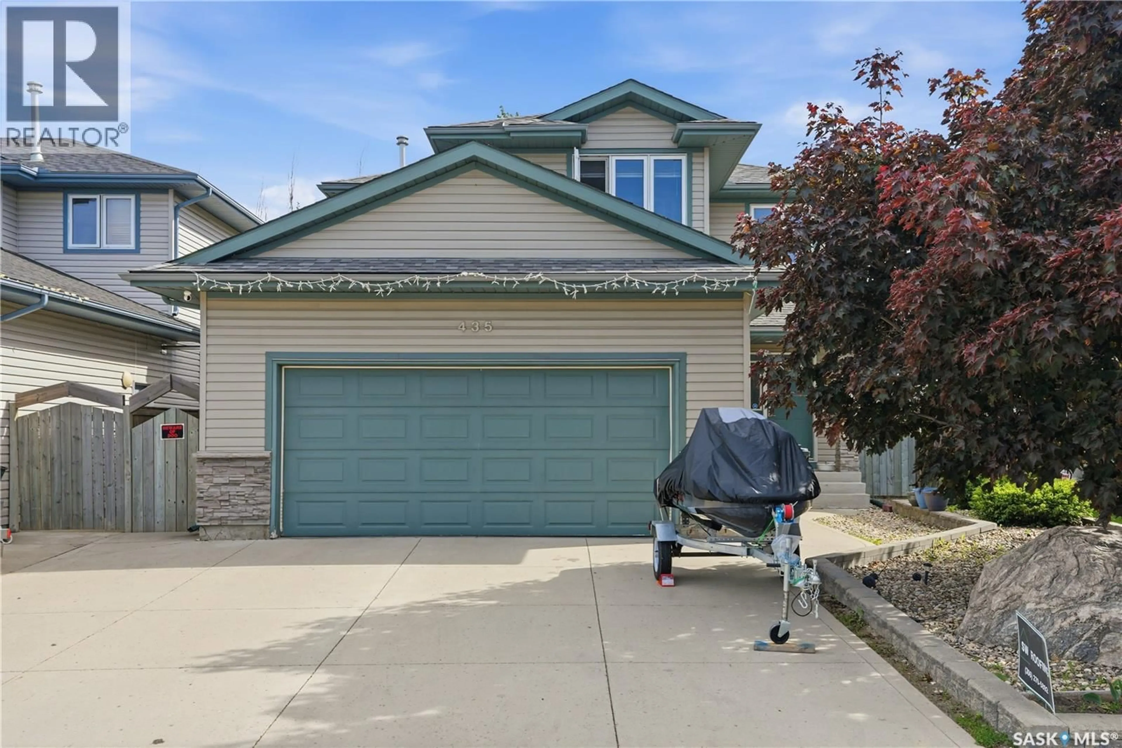 Home with vinyl exterior material, street for 435 BUCKWOLD COVE, Saskatoon Saskatchewan S7N4V9