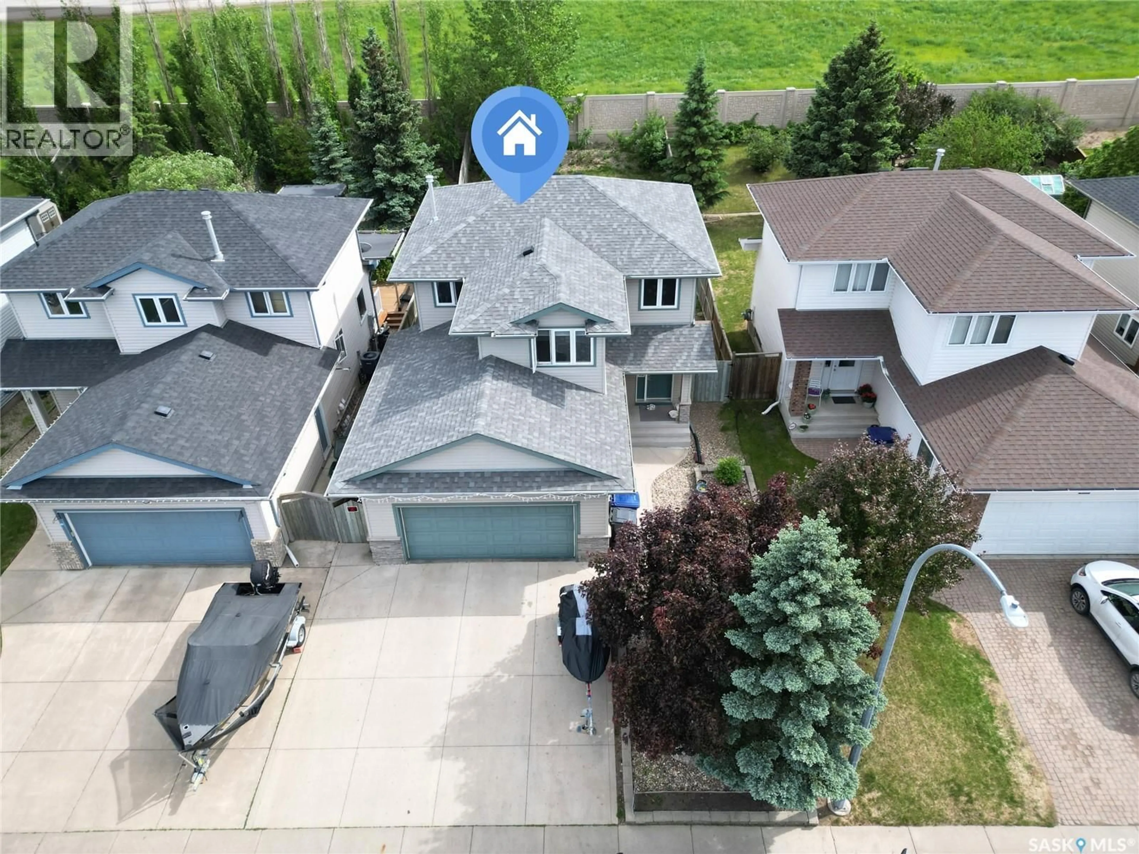 A pic from outside/outdoor area/front of a property/back of a property/a pic from drone, street for 435 BUCKWOLD COVE, Saskatoon Saskatchewan S7N4V9