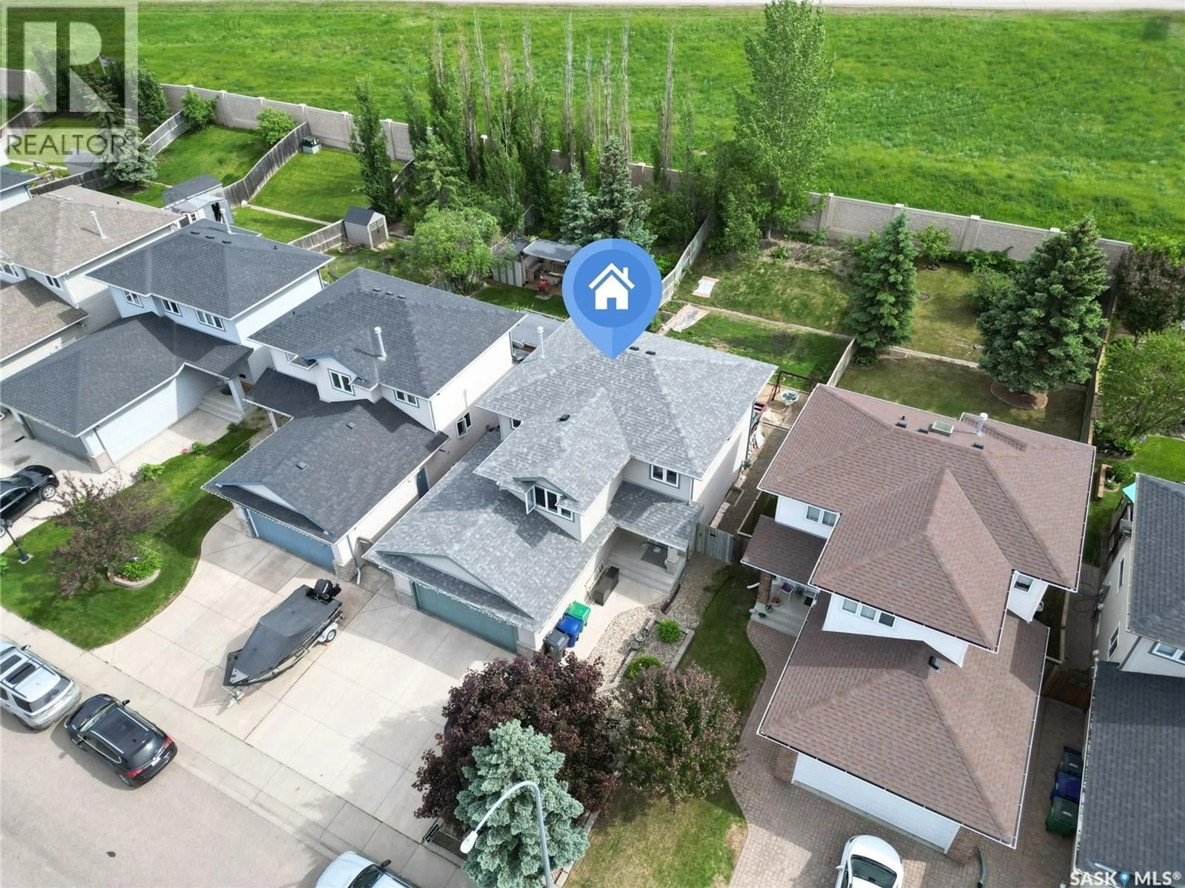 A pic from outside/outdoor area/front of a property/back of a property/a pic from drone, street for 435 BUCKWOLD COVE, Saskatoon Saskatchewan S7N4V9