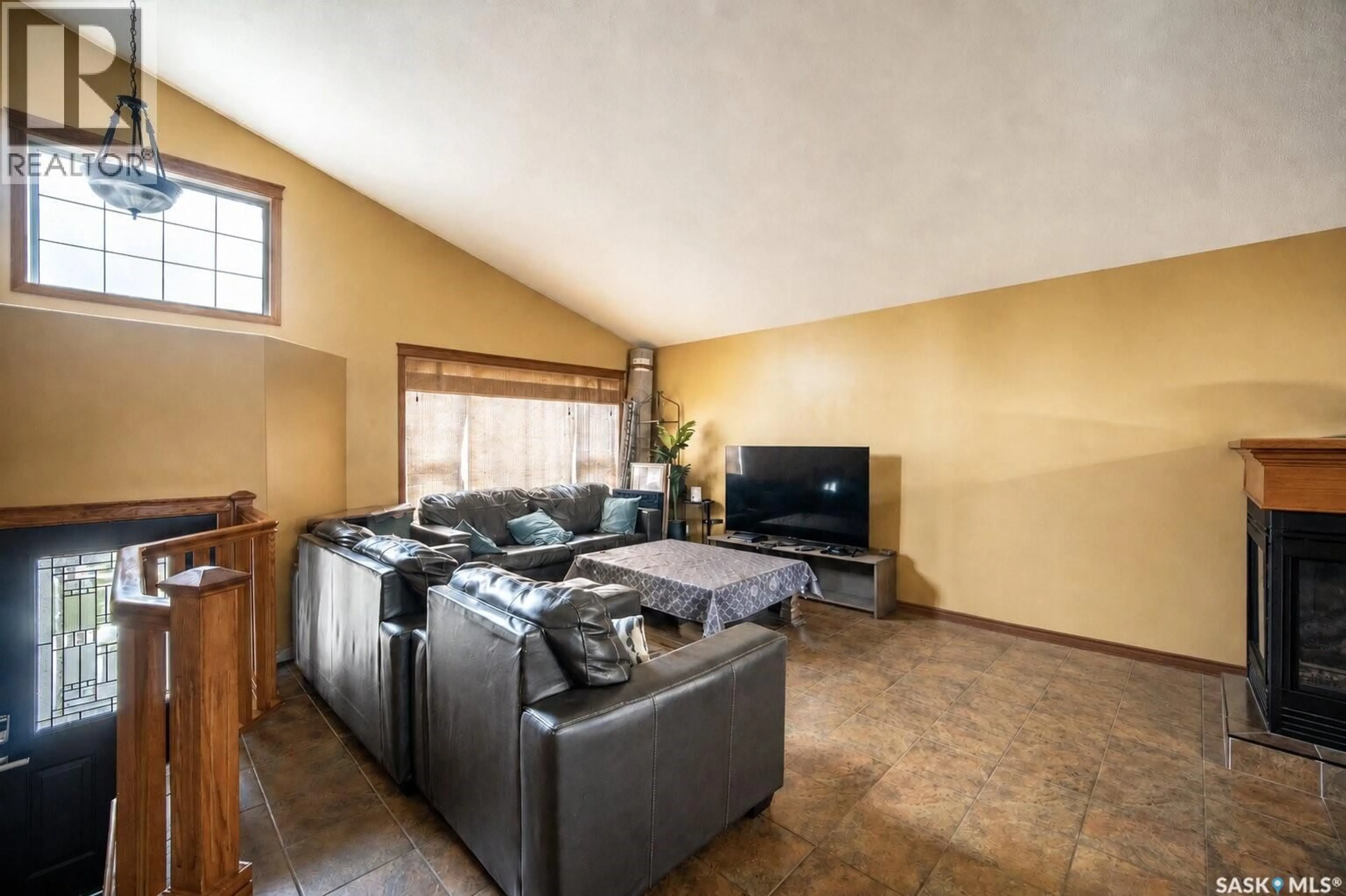Living room with furniture, unknown for 703 BEECHMONT LANE, Saskatoon Saskatchewan S7V1C9